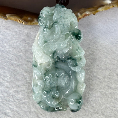 Type A Light Green and Blueish Green Piao Hua Jadeite Dragon Pendent 56.26g 71.1 by 34.2 by 13.4 mm - Huangs Jadeite and Jewelry Pte Ltd