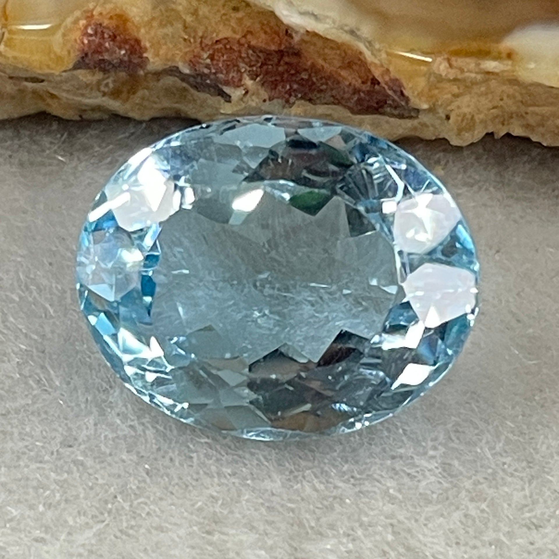 Natural Sky Blue Topaz Oval Shape 12.31ct 14.8 by 12.0 by 8.1mm - Huangs Jadeite and Jewelry Pte Ltd