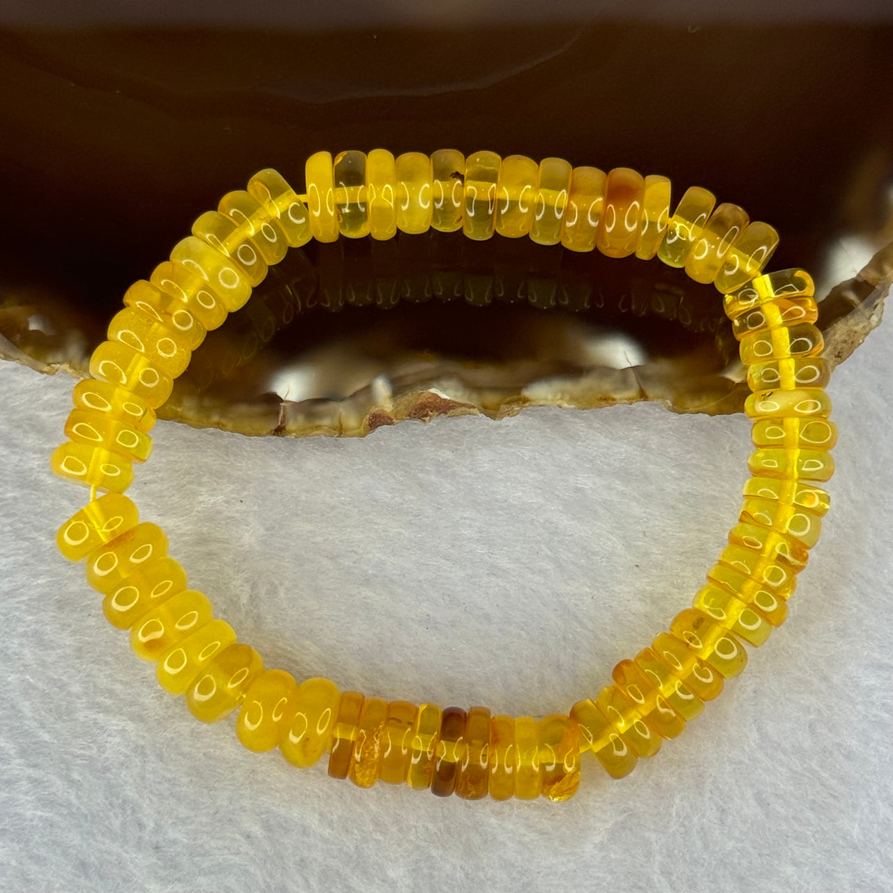 Natural Amber Ping An Kou Donut Shape Bracelet 天然琥珀手链 10.27g 16.5cm 9.2 by 3.3mm 70pcs - Huangs Jadeite and Jewelry Pte Ltd