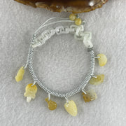 Natural Type A Yellowish Jadeite Money Bag Hulu Fu Butterfly in String Bracelet 8.79g 16-20cm 12.7 by 8.8 by 6.9mm - Huangs Jadeite and Jewelry Pte Ltd