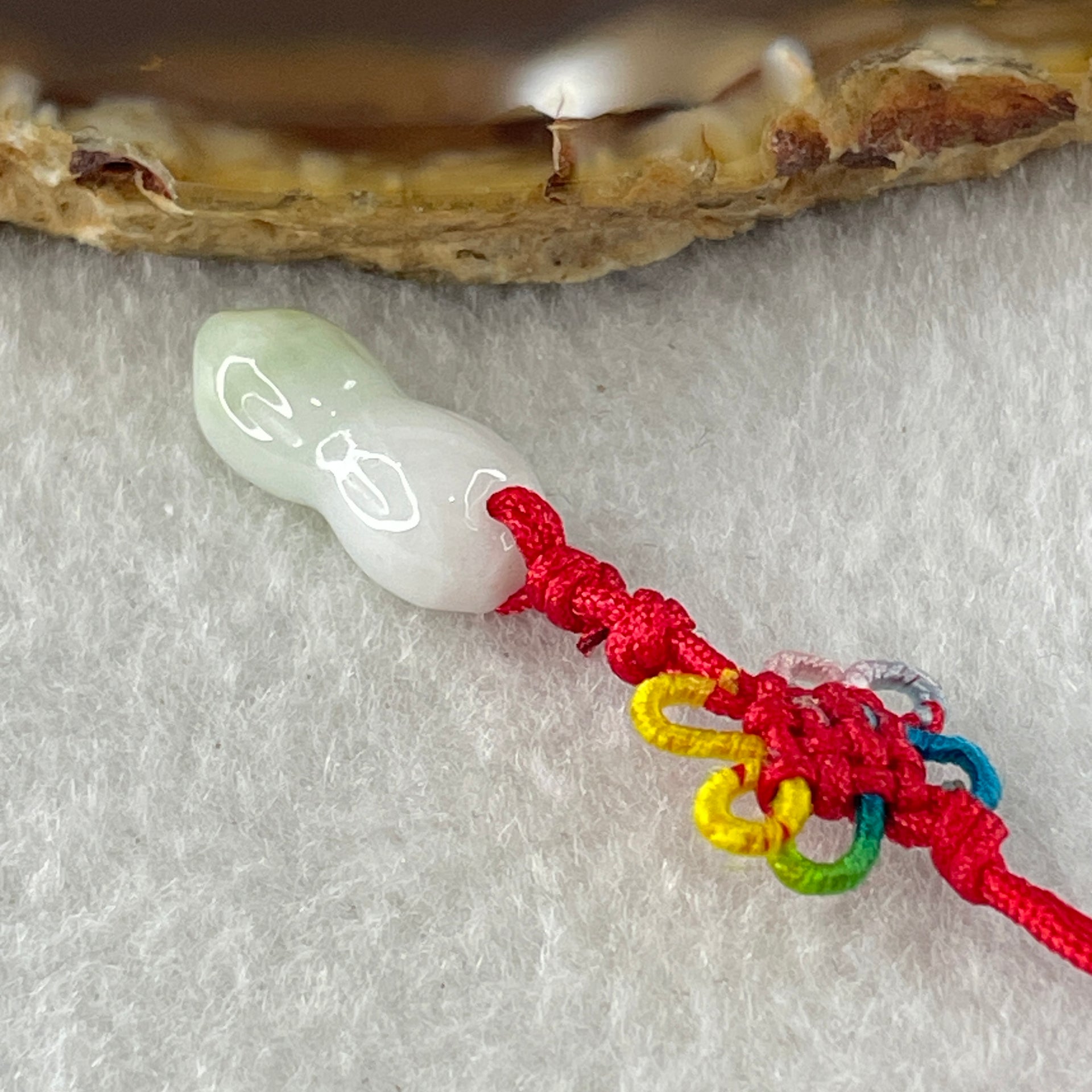 Type A Green with Lavender Jadeite Peanut Charm 1.78g 18.0 by 6.5mm - Huangs Jadeite and Jewelry Pte Ltd