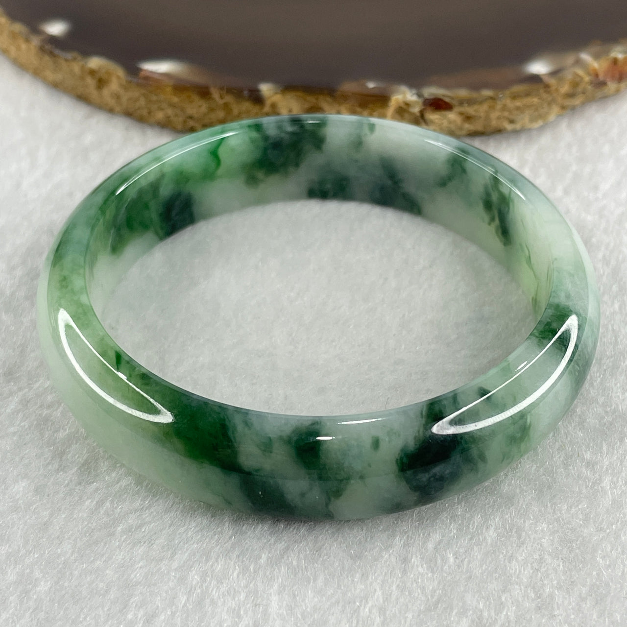Certified Type A Natural Green with Emerald Green and White Spot Jadeite Bangle 52.78g Inner Diameter 57.7mm 14.0 by 8.9mm (Very Very Slight Internal Line and Sight External Rough)