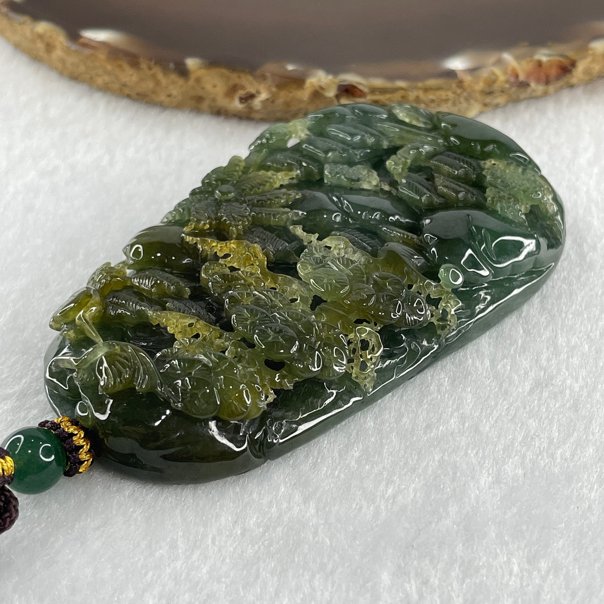 Grand Master Type Green with Brownish Yellow Jadeite Shan Shui with Gui Ren Pendant 112.63g 80.3 by 46.8 by 13.0mm - Huangs Jadeite and Jewelry Pte Ltd