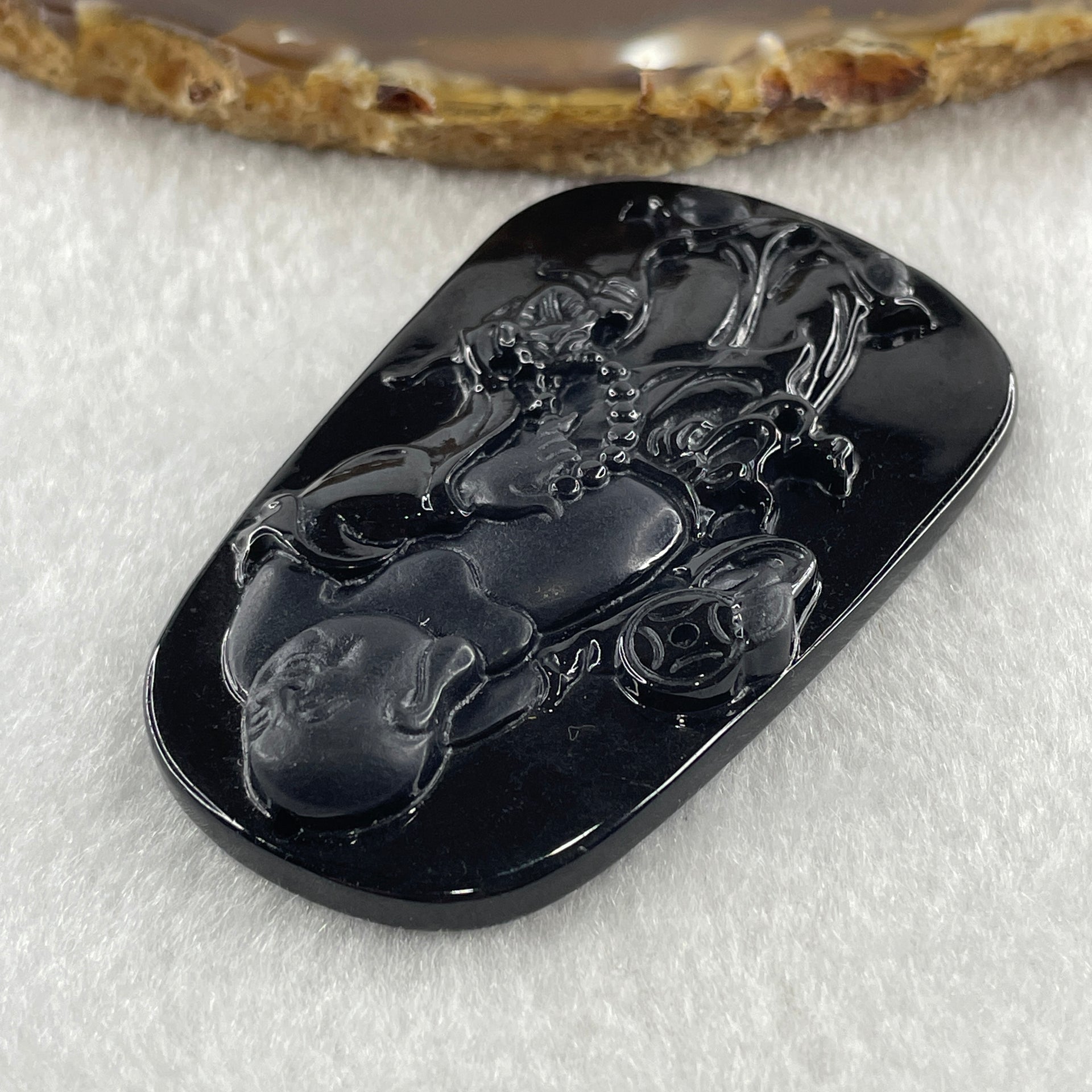 Type A Opaque to Partial Translucent Black Omphacite Jadeite Milo Laughing Buddha Pendant 22.86g 64.6 by 40.5 by 8.7mm - Huangs Jadeite and Jewelry Pte Ltd