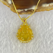 Natural Yellow Amber Milo Buddha Pendent in Gold Color Silver Necklace 4.44g 15.7 by 14.3 by 5.0mm - Huangs Jadeite and Jewelry Pte Ltd
