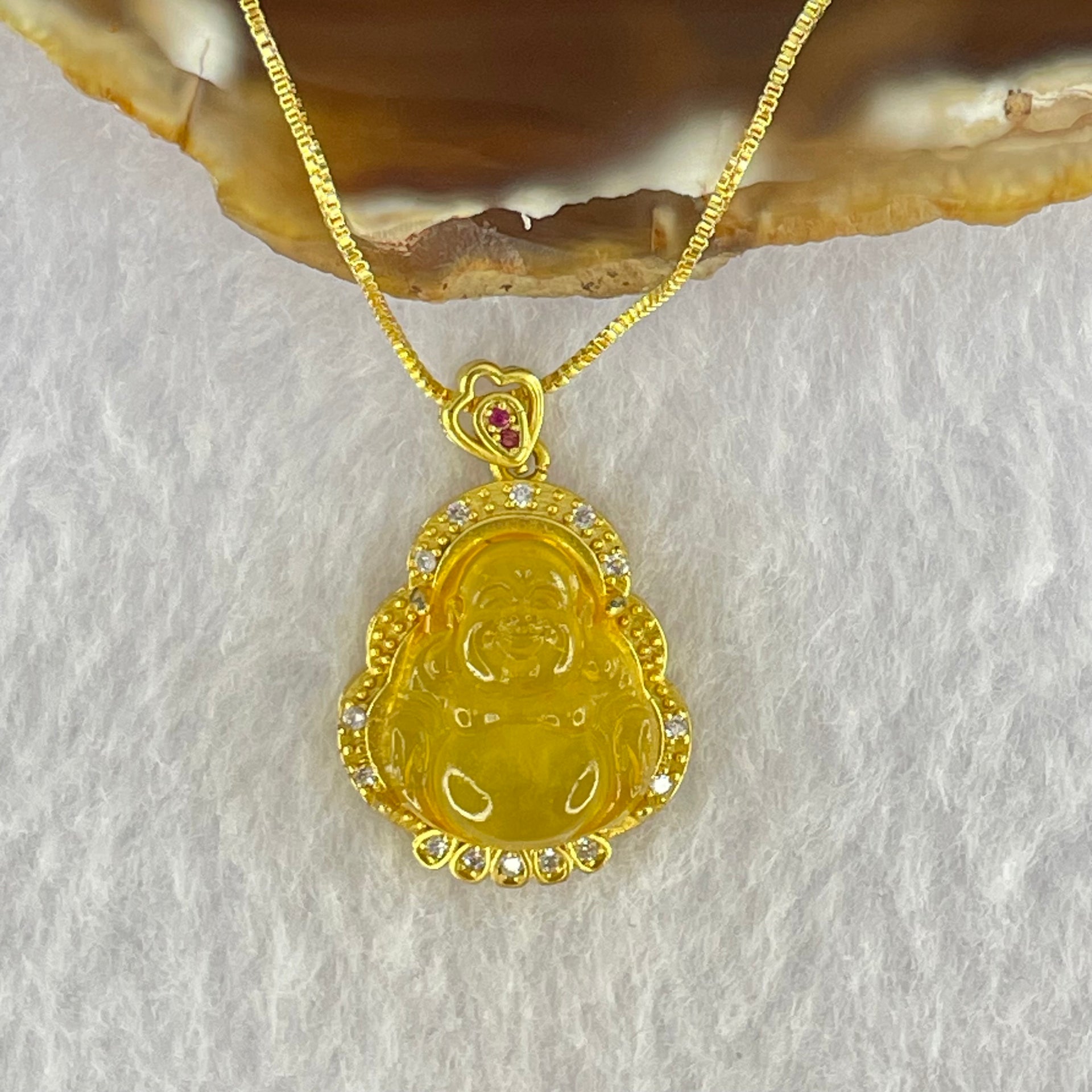 Natural Yellow Amber Milo Buddha Pendent in Gold Color Silver Necklace 4.44g 15.7 by 14.3 by 5.0mm - Huangs Jadeite and Jewelry Pte Ltd