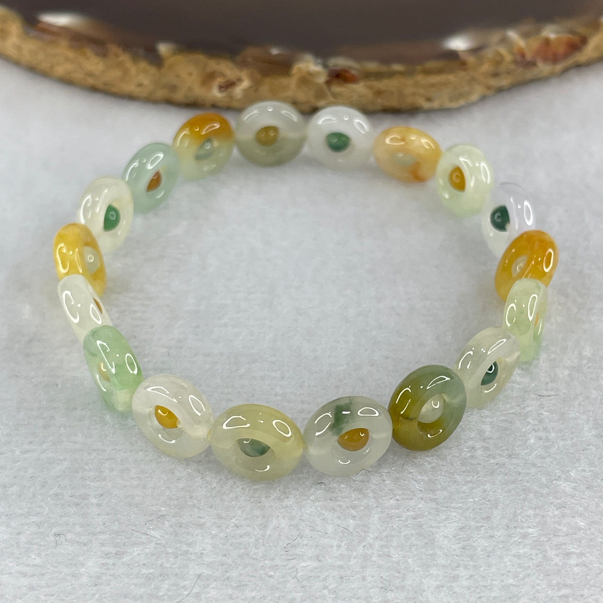Natural Type A Muti Green with Lavender Yellowish Jadeite Donut Bracelet 12.17g 15.5cm 9.9 by 3.2mm 18 Ping An Kow - Huangs Jadeite and Jewelry Pte Ltd