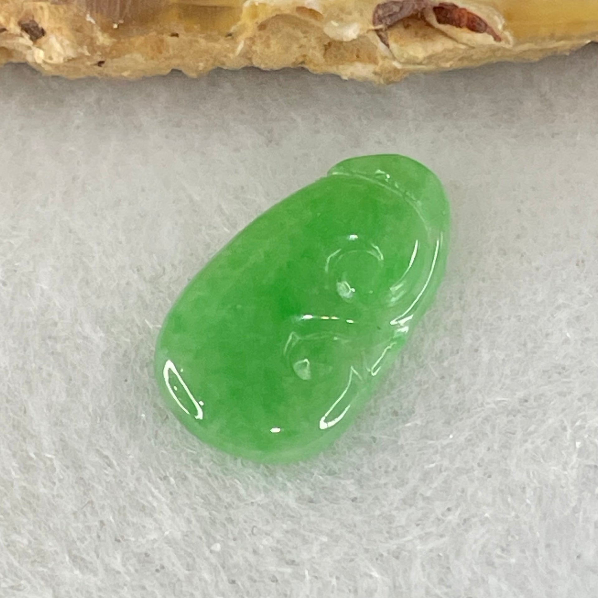 Type A Old Mine Spicy Green Jadeite Ruyi Charm Stone For Setting 0.36g 14.1 by 8.3mm by 1.4mm - Huangs Jadeite and Jewelry Pte Ltd