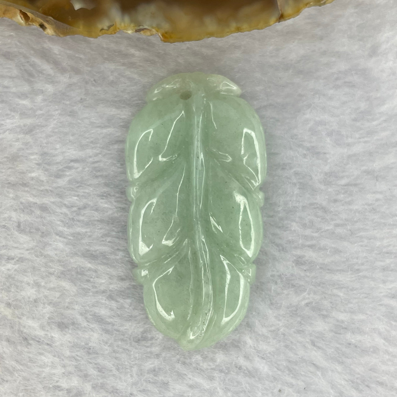Type A Light Apple Green Jadeite Leaf signifies Over Night Success 一夜发财 9.80g 39.5 by 20.5 by 6.5mm - Huangs Jadeite and Jewelry Pte Ltd