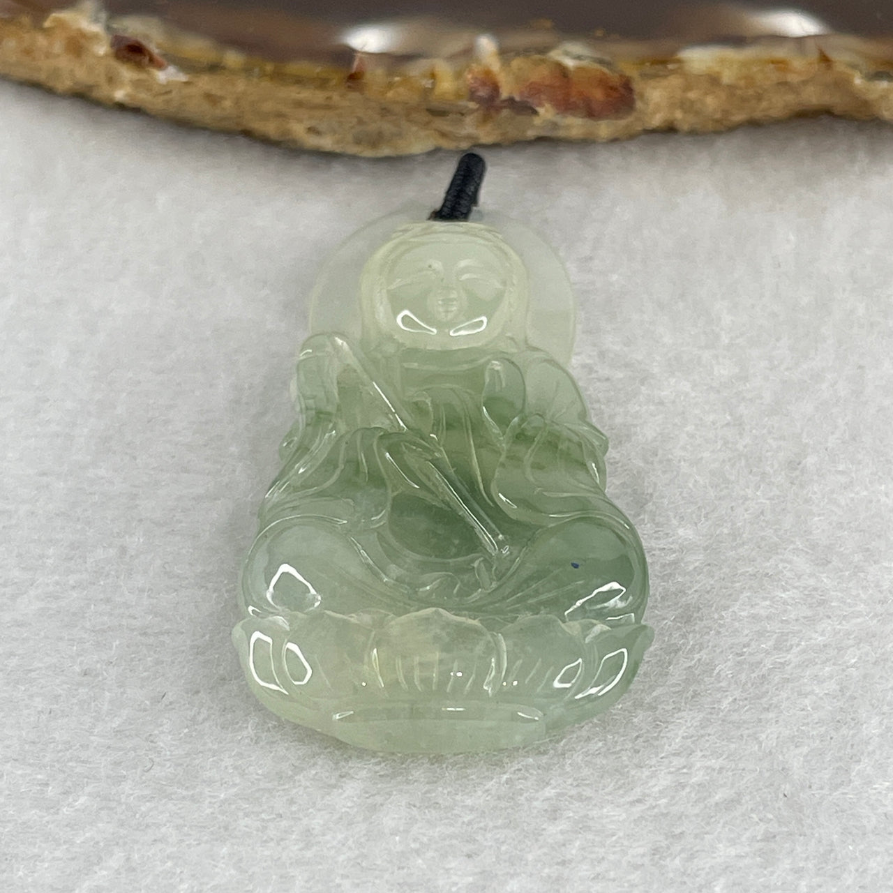 Natural Type A Icy Faint Green with Green Piao Hua Jadeite Guan Yin on Lotus Flower Pendant 16.91g 52.0 by 26.3 by 7.6mm