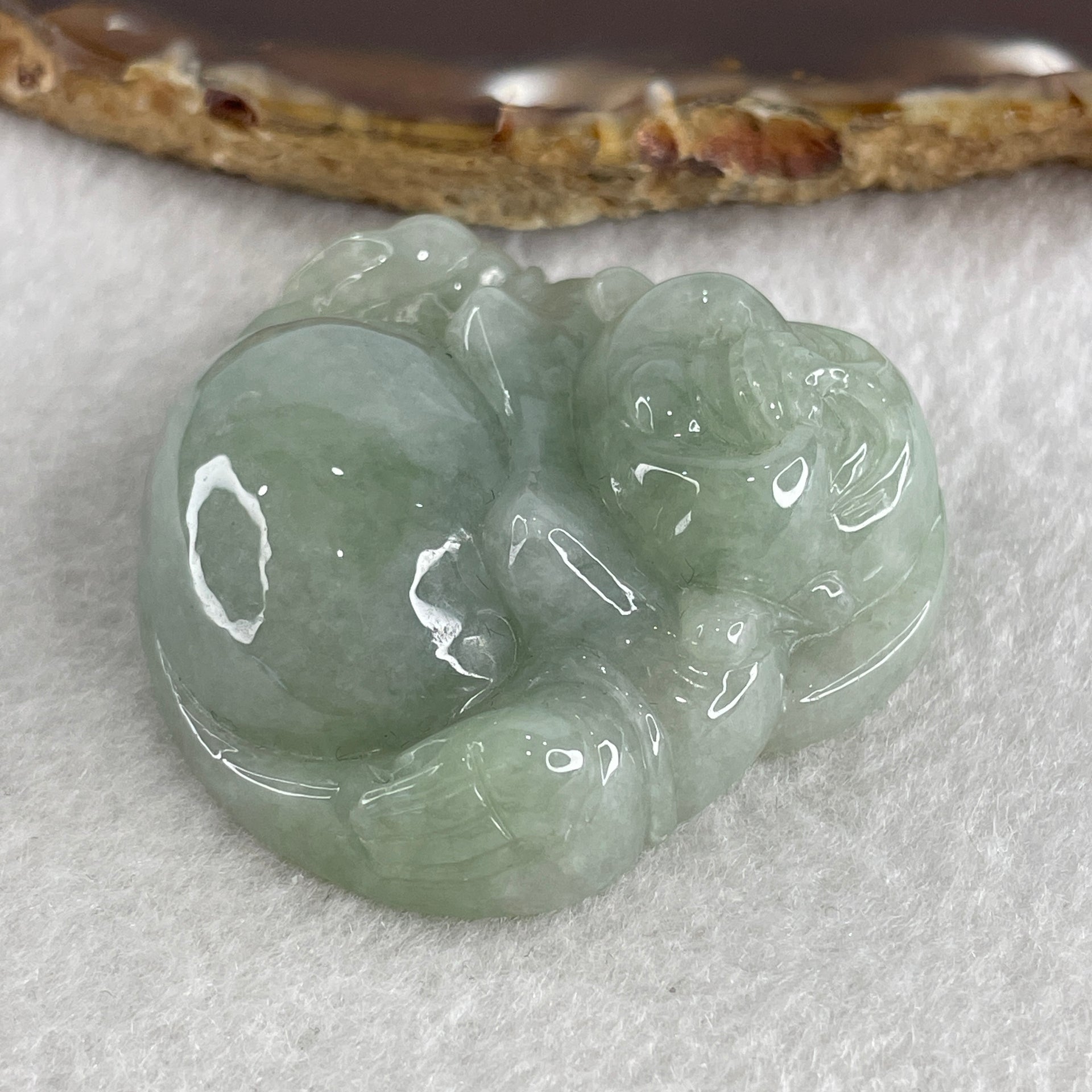 Natural Type A Green Jadeite Milo Laughing Buddha Pendant 47.59g 46.1 by 48.7 by 14.6mm - Huangs Jadeite and Jewelry Pte Ltd
