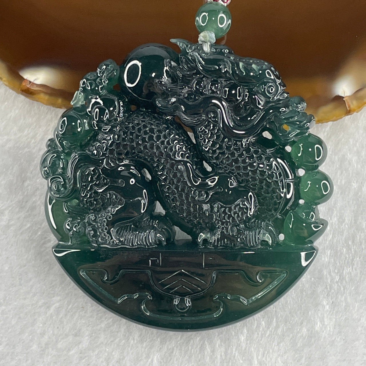 Type A Semi Icy Blueish Green Jadeite Double Dragon Pendant 71.30g 54.0 by 11.9mm