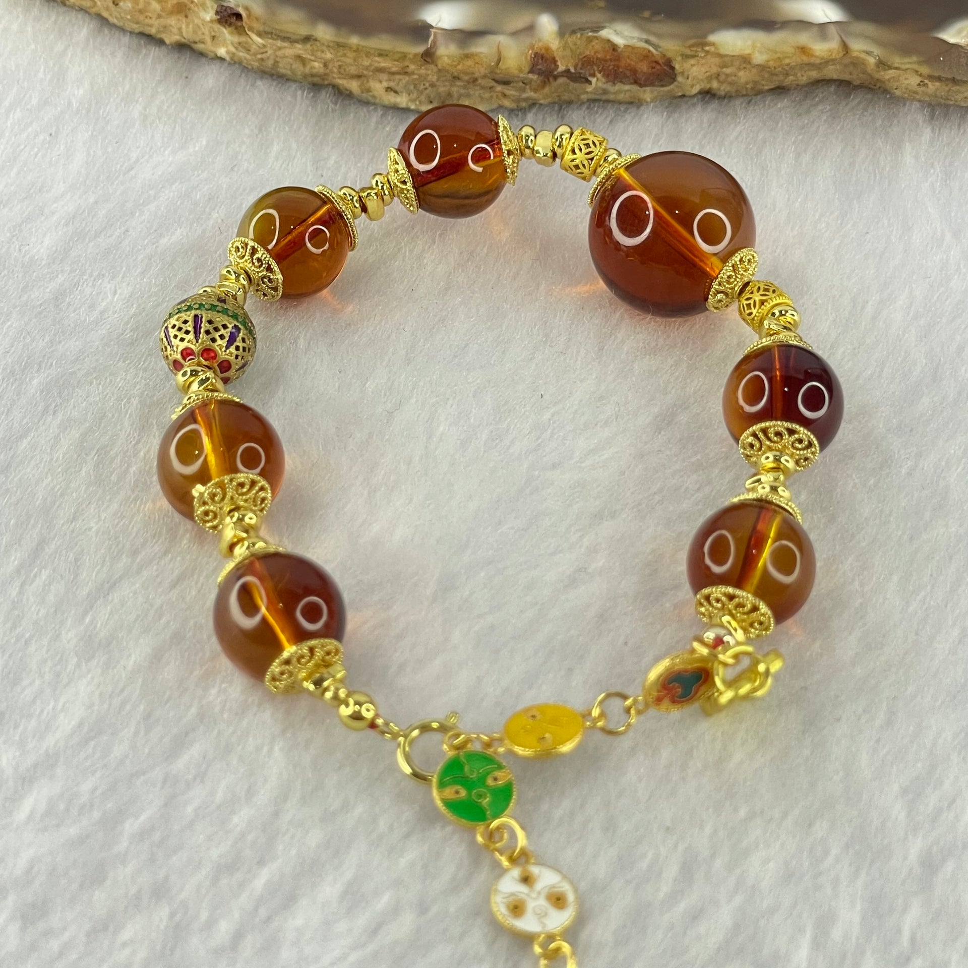 Natural Purple Honey Amber Beads in S925 Gold Color Bracelet 天然紫蜜琥珀手链10.66g 13.8mm 1 Bead 9.8mm 7 Beads - Huangs Jadeite and Jewelry Pte Ltd