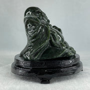 Natural Dark Green Serpentine Laughing Milo Buddha with Wealth Pot with Wooden Stand Display 1,656.6g 190.0 by 133.0 by 127.0mm - Huangs Jadeite and Jewelry Pte Ltd