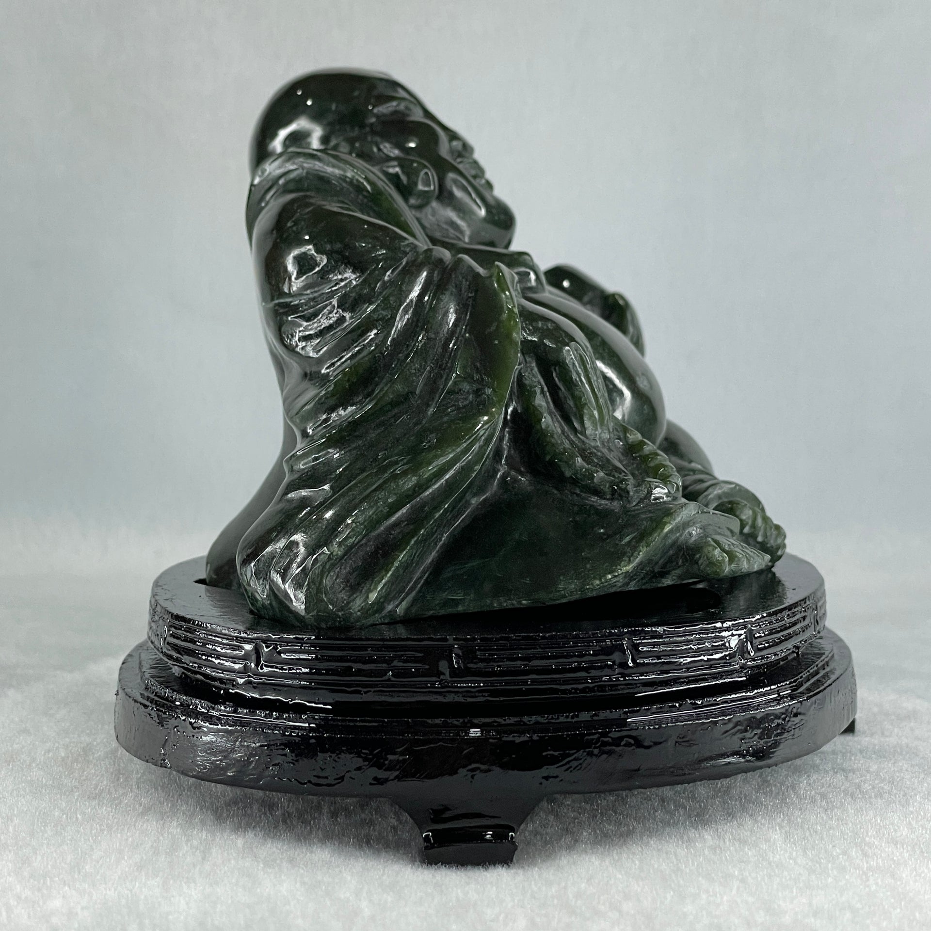 Natural Dark Green Serpentine Laughing Milo Buddha with Wealth Pot with Wooden Stand Display 1,656.6g 190.0 by 133.0 by 127.0mm - Huangs Jadeite and Jewelry Pte Ltd