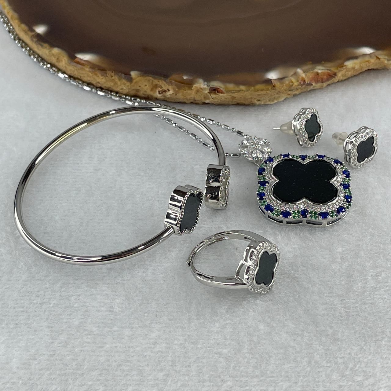 Certified Natural Type A Black Omphacite Jadeite 4 Leafs Clover in S925 Sliver Set of Earrings 6.6 by 6.4mm, Ring and Bracelet 9.9 by 8.9mm, Pendant 17.0 by 14.0mm Total 21.55g - Huangs Jadeite and Jewelry Pte Ltd