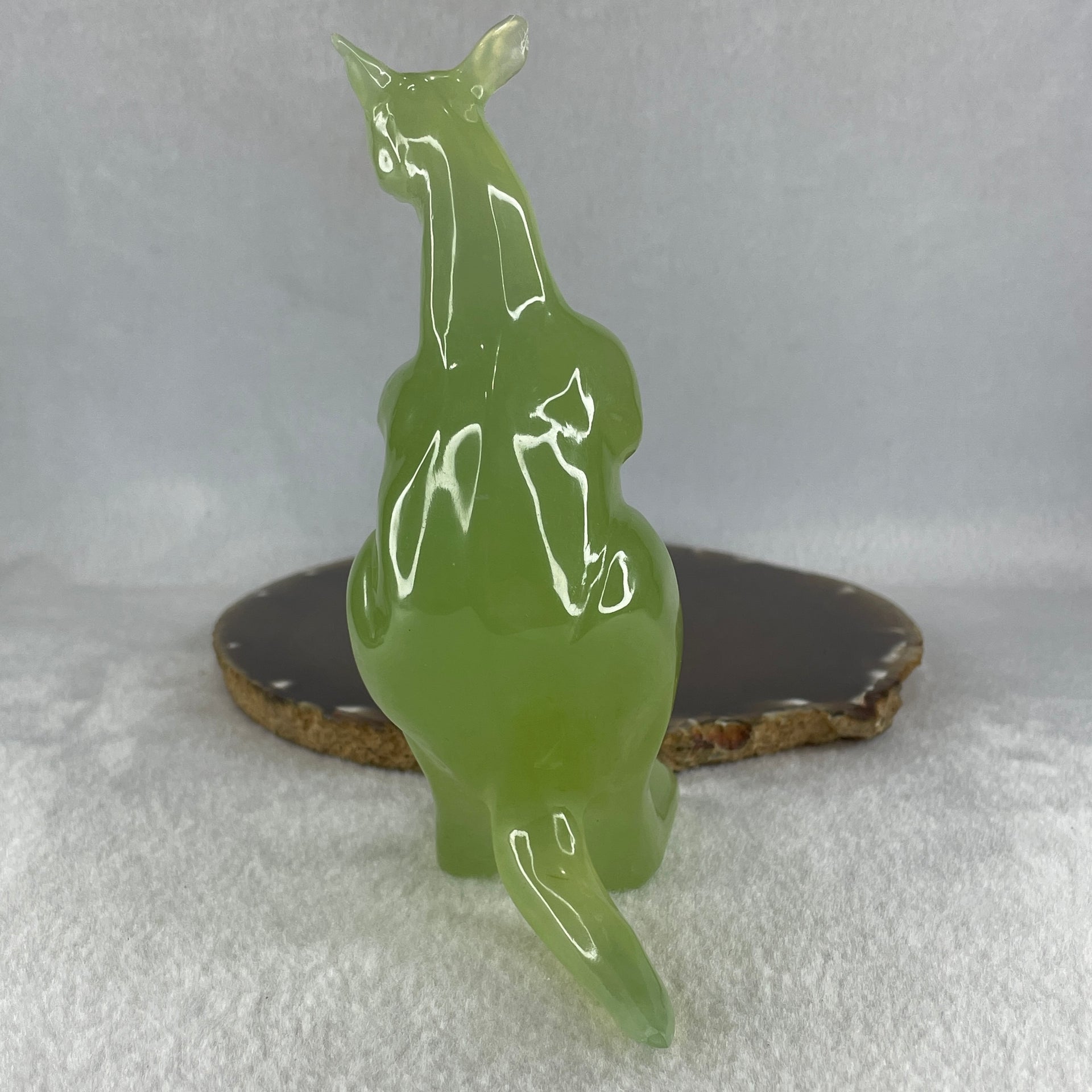 Natural Green Serpentine Kangaroo with Baby with Wooden Stand Display 382.2g 119.5 by 63.0 by 159.0mm - Huangs Jadeite and Jewelry Pte Ltd