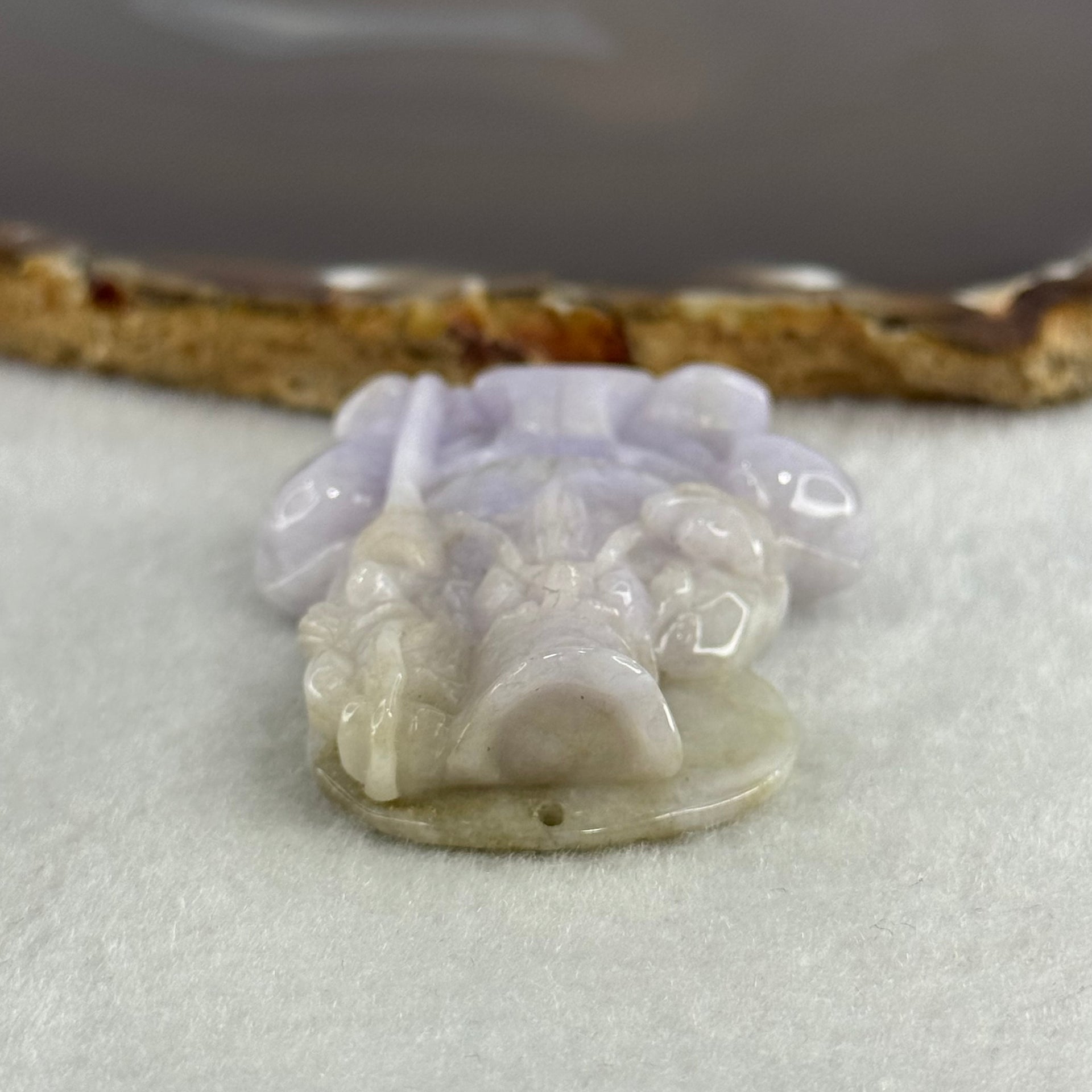 Type A Lavender with Slight Green Jadeite Tu Di Gong 38.27g 48.0 by 39.3 by 11.9mm - Huangs Jadeite and Jewelry Pte Ltd