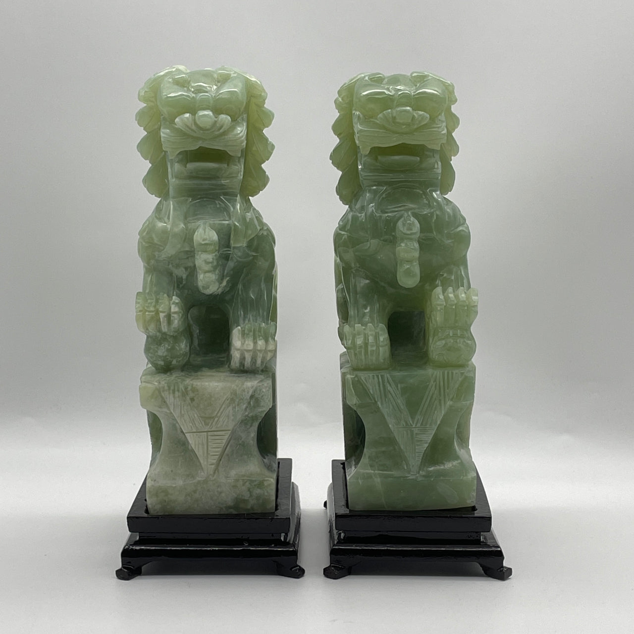 Natural Green with White Serpentine Pair of Fu Gou with Wooden Stand Display 2,785.2g 136.0 by 92.0 by 255.0mm and 2,819.4g 138.5 by 90.0 by 250.0mm