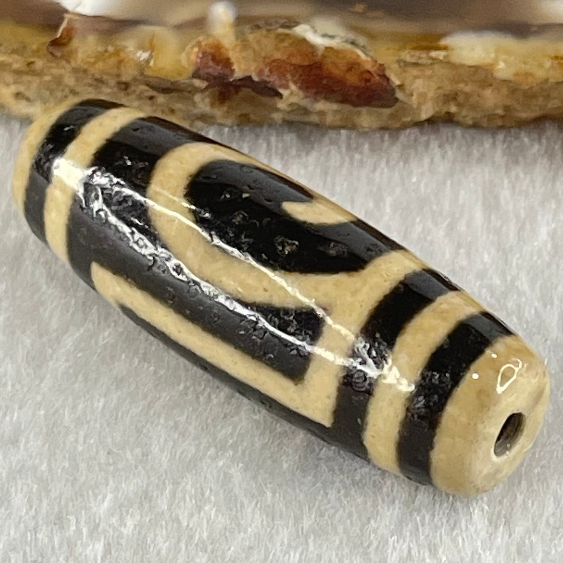 Natural Powerful Tibetan Old Oily Agate Double Du Mu Dzi Bead Heavenly Master (Tian Zhu) 
10.11g 37.8 by 13.0mm - Huangs Jadeite and Jewelry Pte Ltd