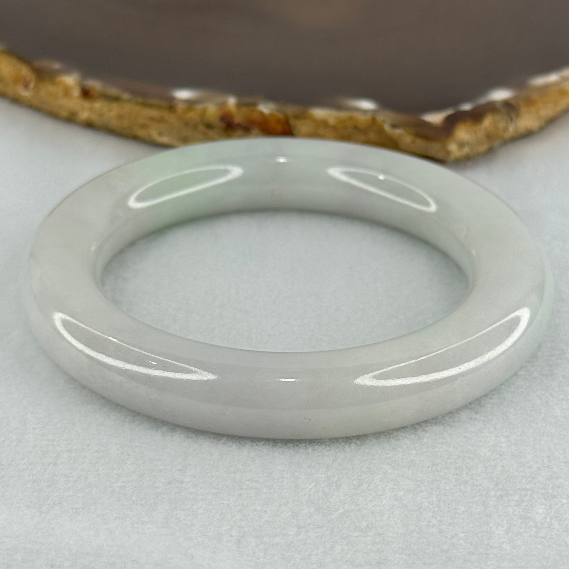 Type A Translucent Faint Blueish Green with Faint Lavender Jadeite Bangle Internal Diameter 56.79mm 437.29cts 87.85g 12.0 by 13.0mm With NGI Cert 32886087 (Close to Perfect) - Huangs Jadeite and Jewelry Pte Ltd