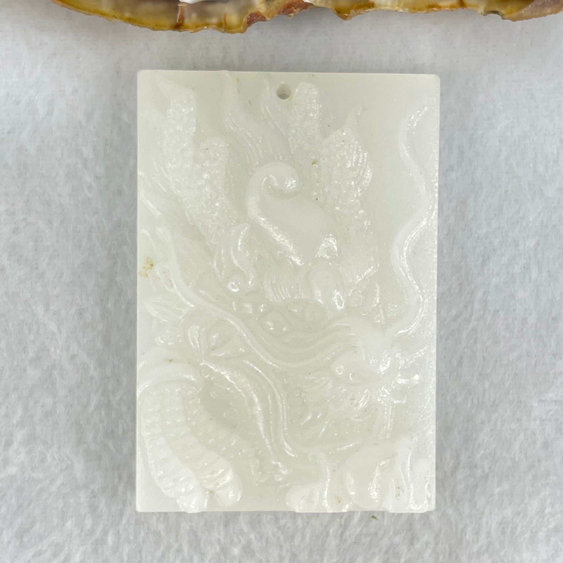 Natural White Nephrite Dragon Pendant 48.48g 57.4 by 39.5 by 11.4mm - Huangs Jadeite and Jewelry Pte Ltd