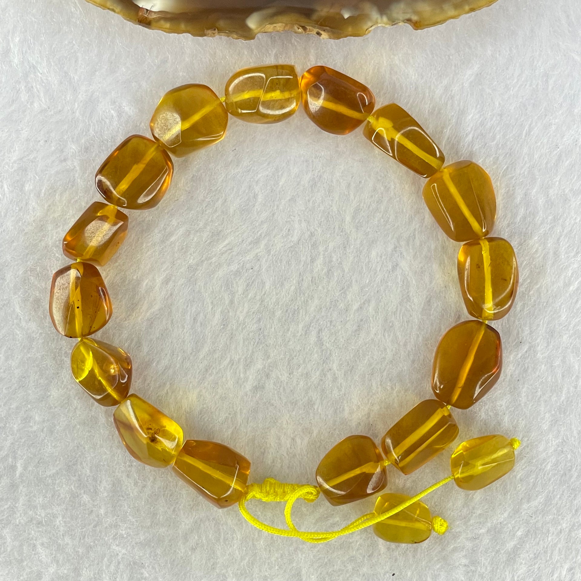 Natural Yellow Amber Fragments Bracelet 11.18g 18cm 15.4 by 10.2 by 8.1mm 15pcs - Huangs Jadeite and Jewelry Pte Ltd