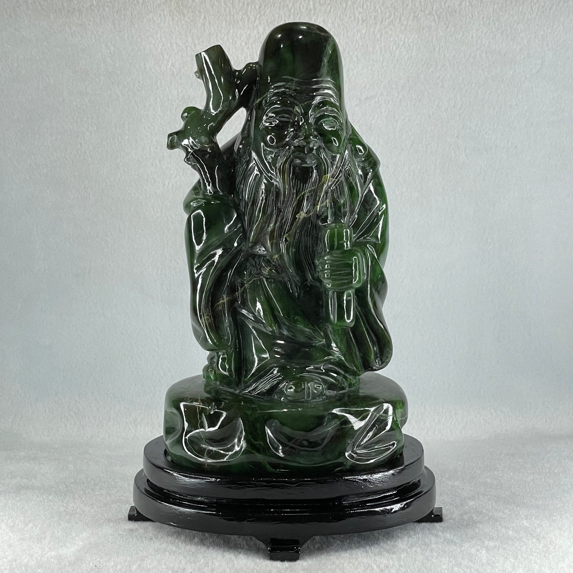 Natural Dark Green Serpentine Shou Xing Gong with Wooden Stand Display 2,374.7g 140.0 by 228.0 by 125.0mm - Huangs Jadeite and Jewelry Pte Ltd