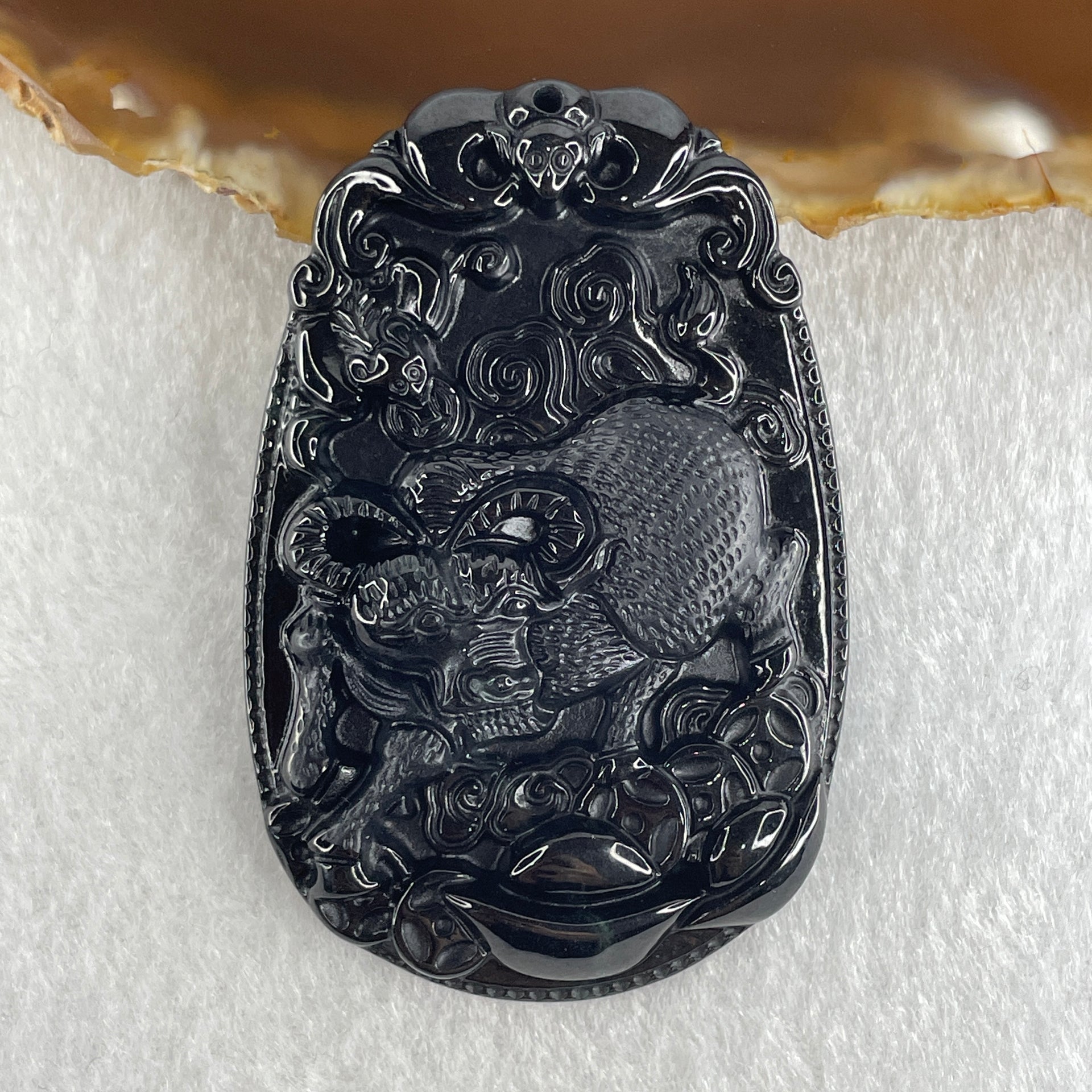 Type A Opaque to Partial Translucent Black Omphacite Jadeite Ox Pendant 20.24g 59.5 by 39.4 by 7.6mm - Huangs Jadeite and Jewelry Pte Ltd