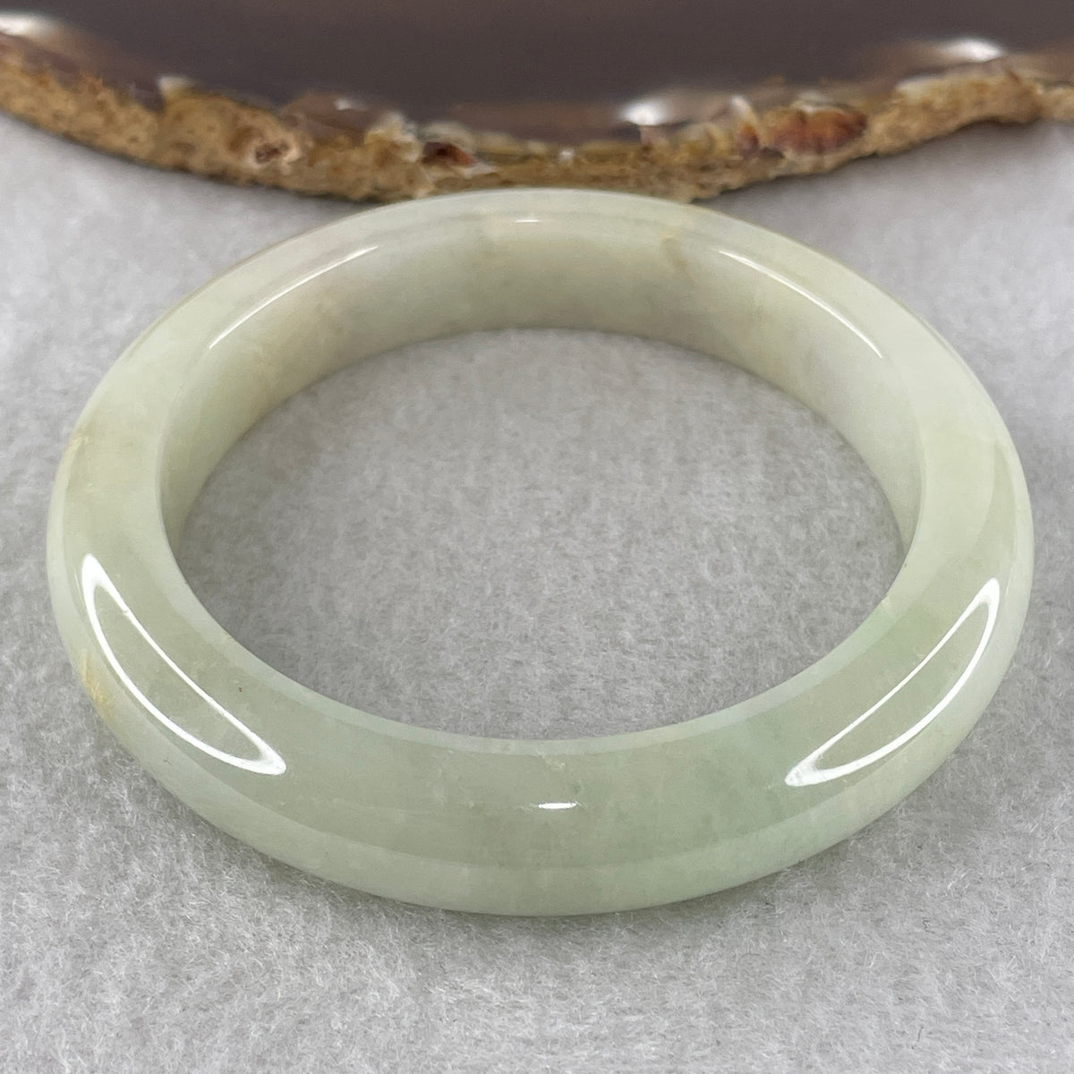 Natural Type Light Green Jadeite Bangle 58.51g Inner Diameter 55.6mm 11.8 by 9.4mm (Internal Line) - Huangs Jadeite and Jewelry Pte Ltd