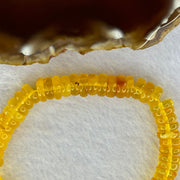 Natural Amber Ping An Kou Donut Shape Bracelet 天然琥珀手链 10.27g 16.5cm 9.2 by 3.3mm 70pcs - Huangs Jadeite and Jewelry Pte Ltd