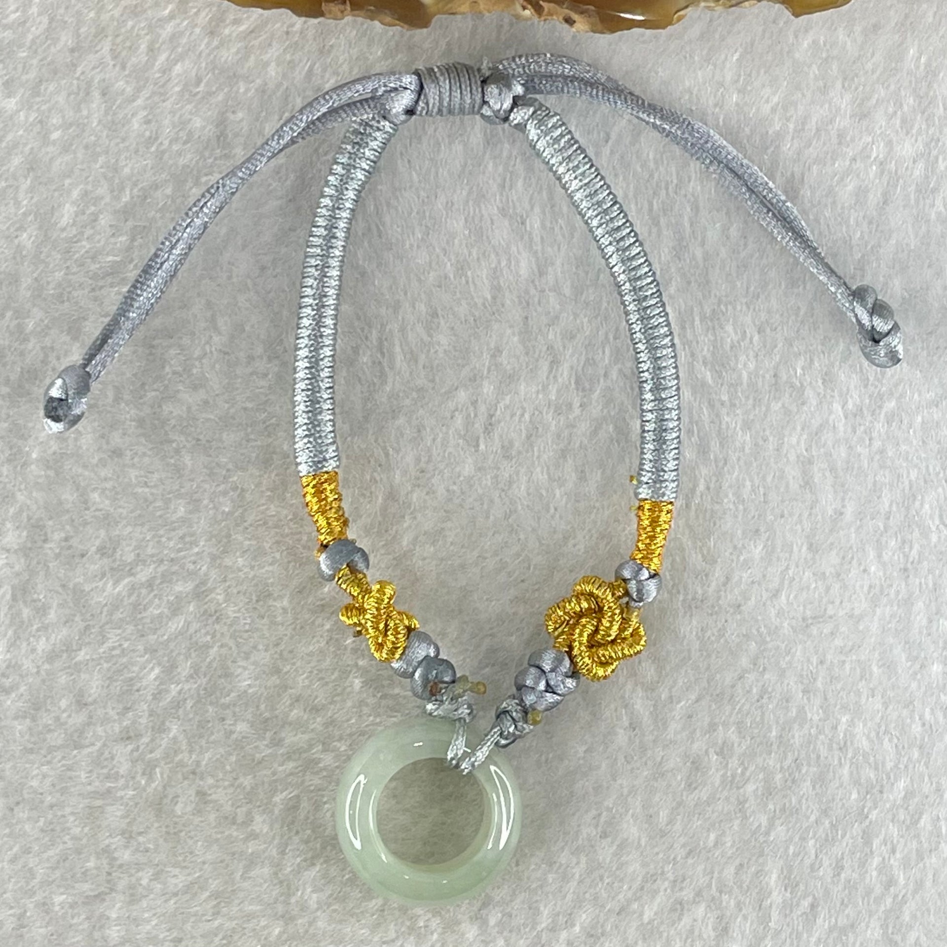 Type A Light Blueish Green Jadeite Ping An Kou String Bracelet 3.13g 15.3 by 6.7mm - Huangs Jadeite and Jewelry Pte Ltd