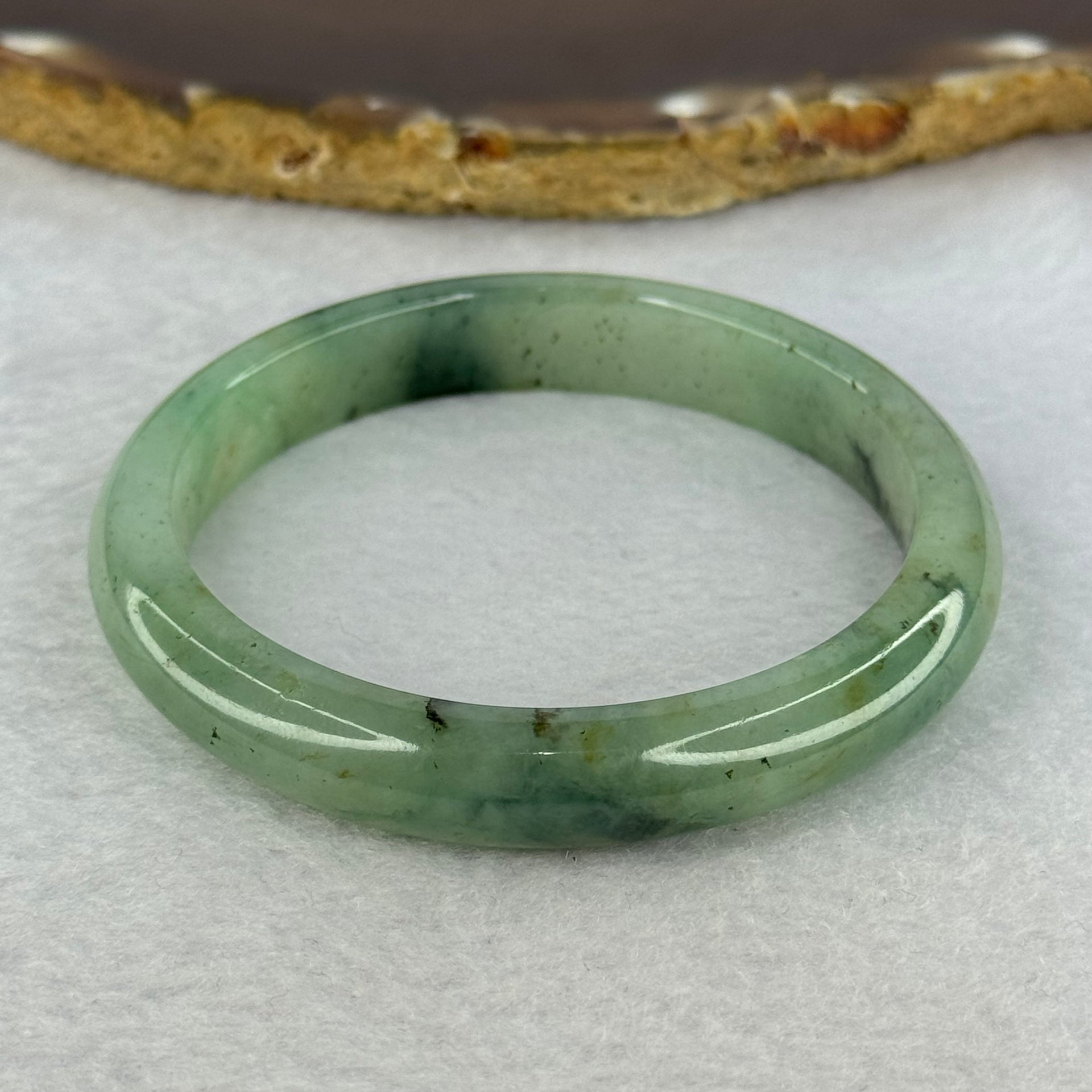 Type A Green Piao Hua Jadeite Bangle Internal Diameter 54.3mm 35.82g 9.9 by 7.5mm (Slight External Line) - Huangs Jadeite and Jewelry Pte Ltd