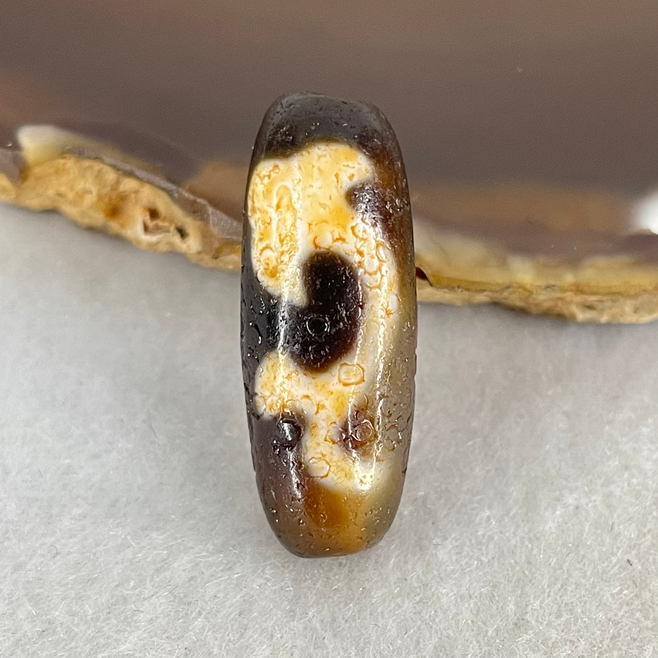 Aged Natural Powerful Tibetan Old Oily Blackish Brown Yellowish White Agate Green Tara Dzi Bead Heavenly Master (Tian Zhu) 绿度母天珠 4.86g 28.5 by 10.8mm - Huangs Jadeite and Jewelry Pte Ltd