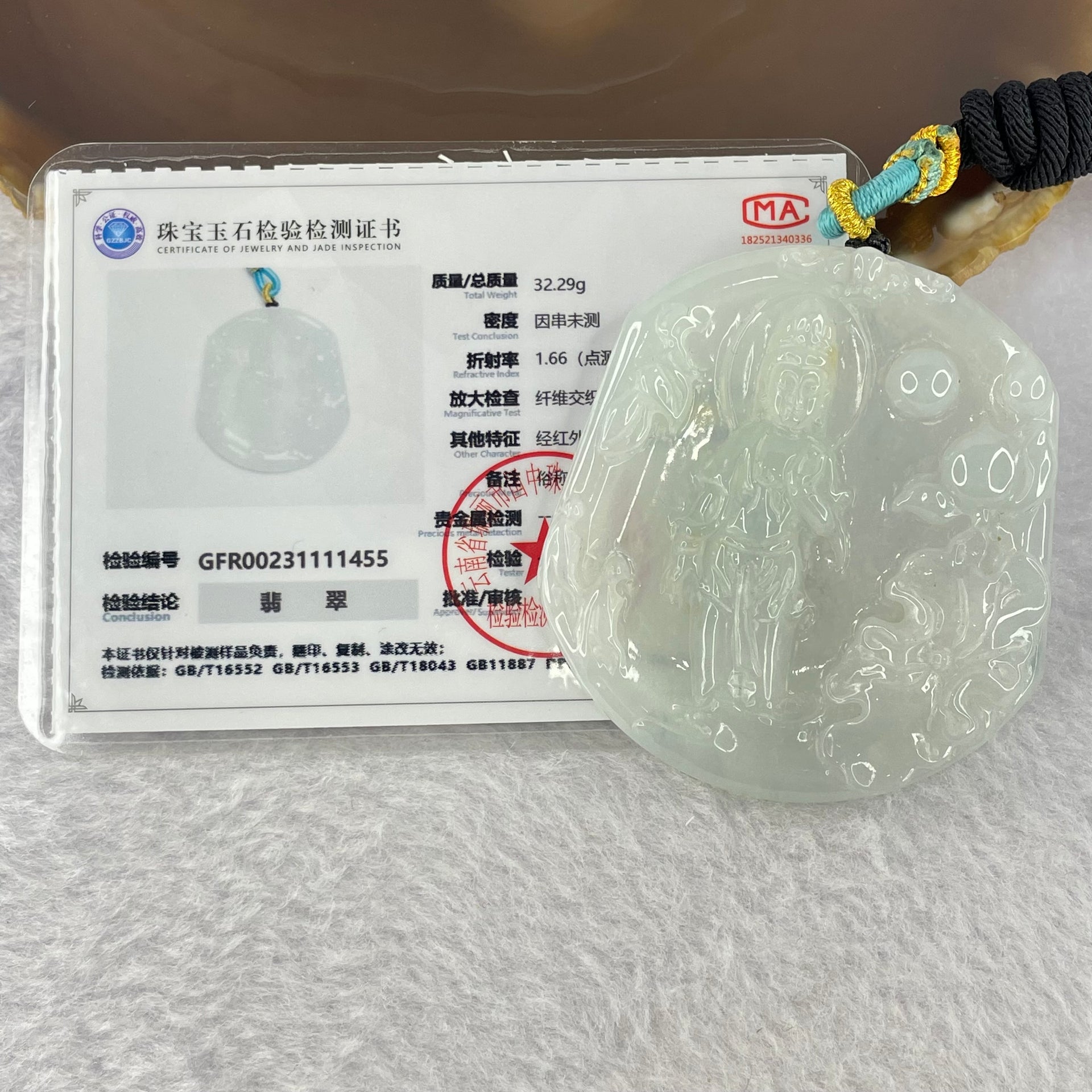 Type A Light Green to white Jadeite Guan Yin Pendent 32.29g 57.8 by 52.6 by 6.6mm - Huangs Jadeite and Jewelry Pte Ltd