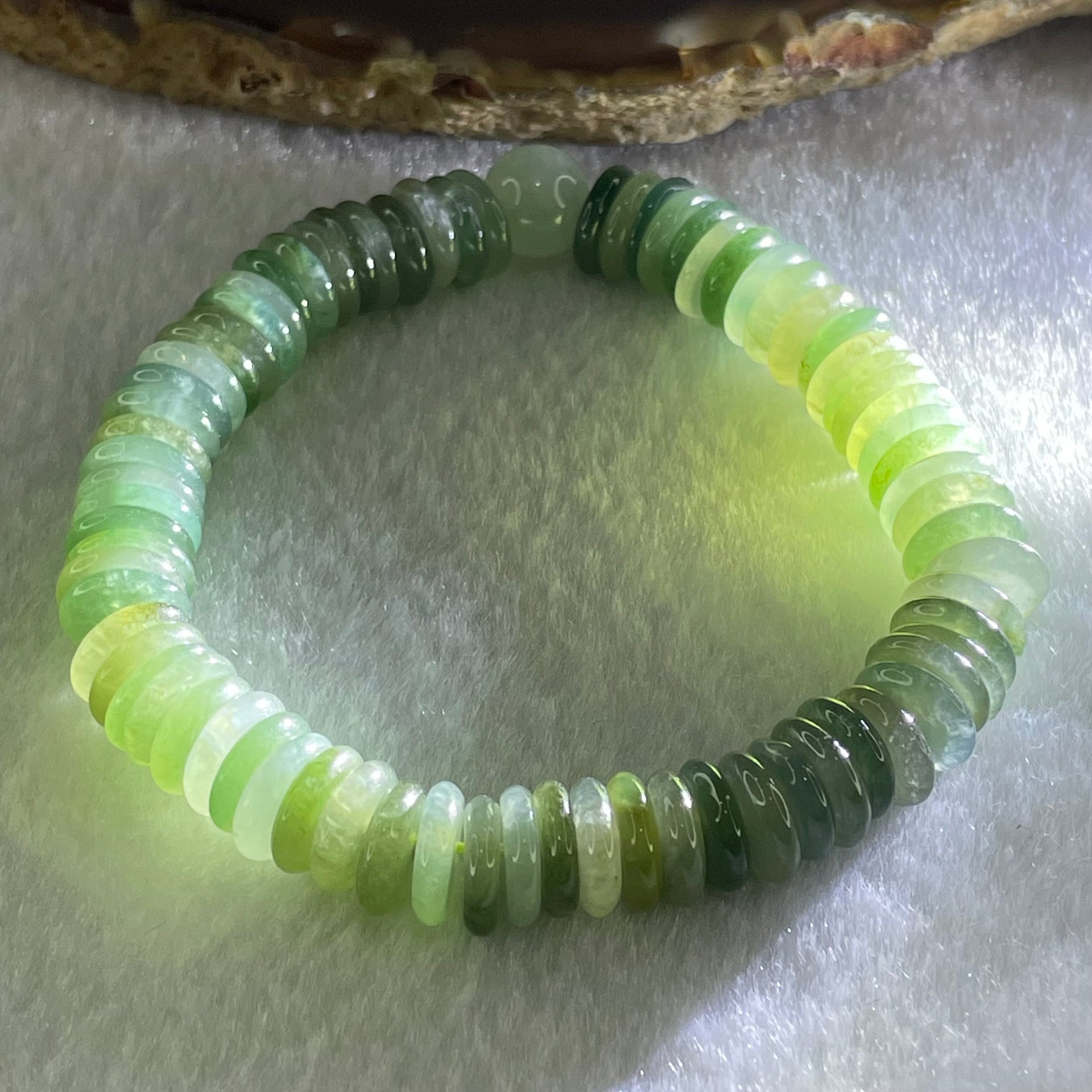 Type A Muti Blueish Green Shades with Yellowish Brown Jadeite Ping An Kou Donut with Jadeite Bead Bracelet 30.03g 15cm 9.0mm 74pcs 8.8mm 1 Beads - Huangs Jadeite and Jewelry Pte Ltd