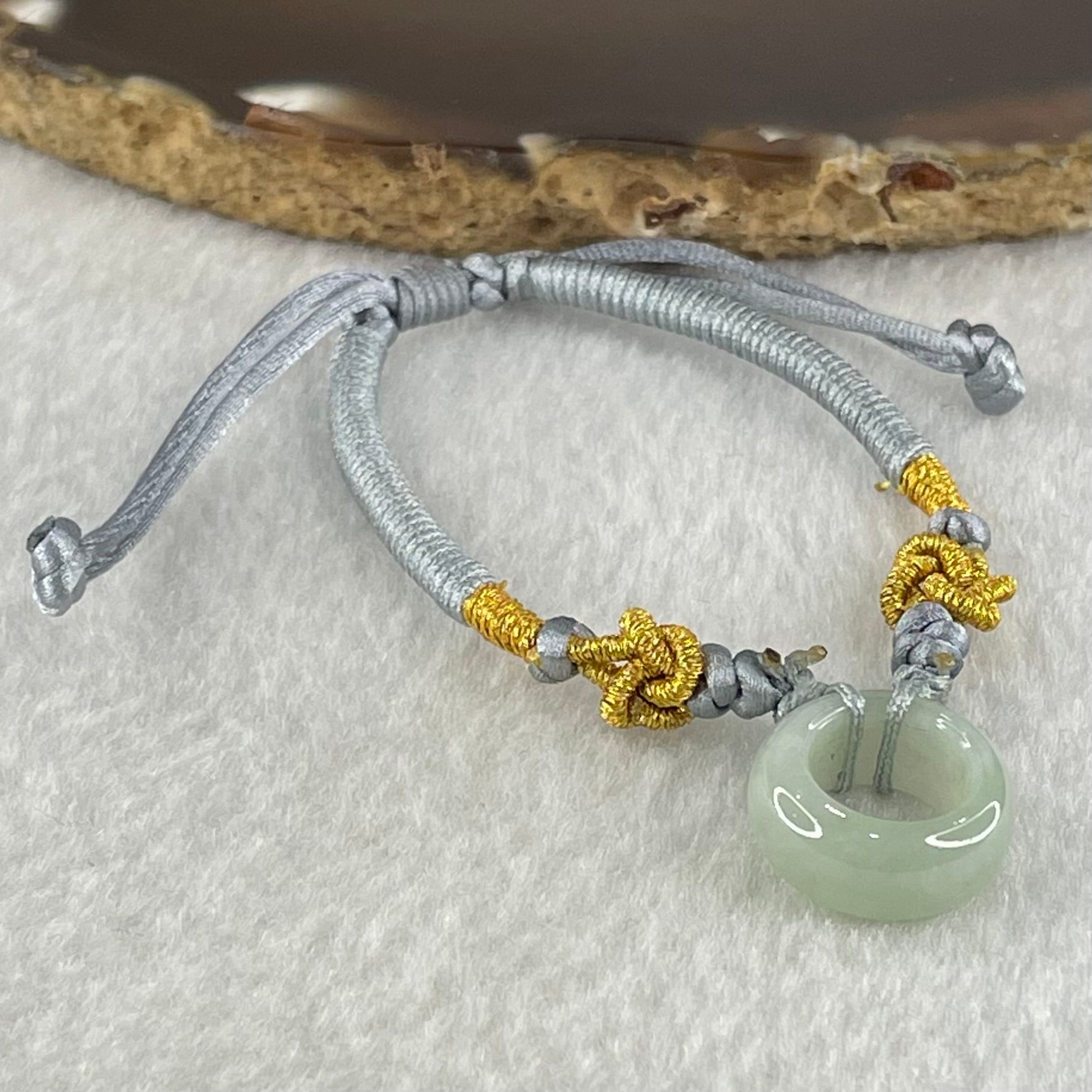 Type A Light Blueish Green Jadeite Ping An Kou String Bracelet 3.13g 15.3 by 6.7mm - Huangs Jadeite and Jewelry Pte Ltd