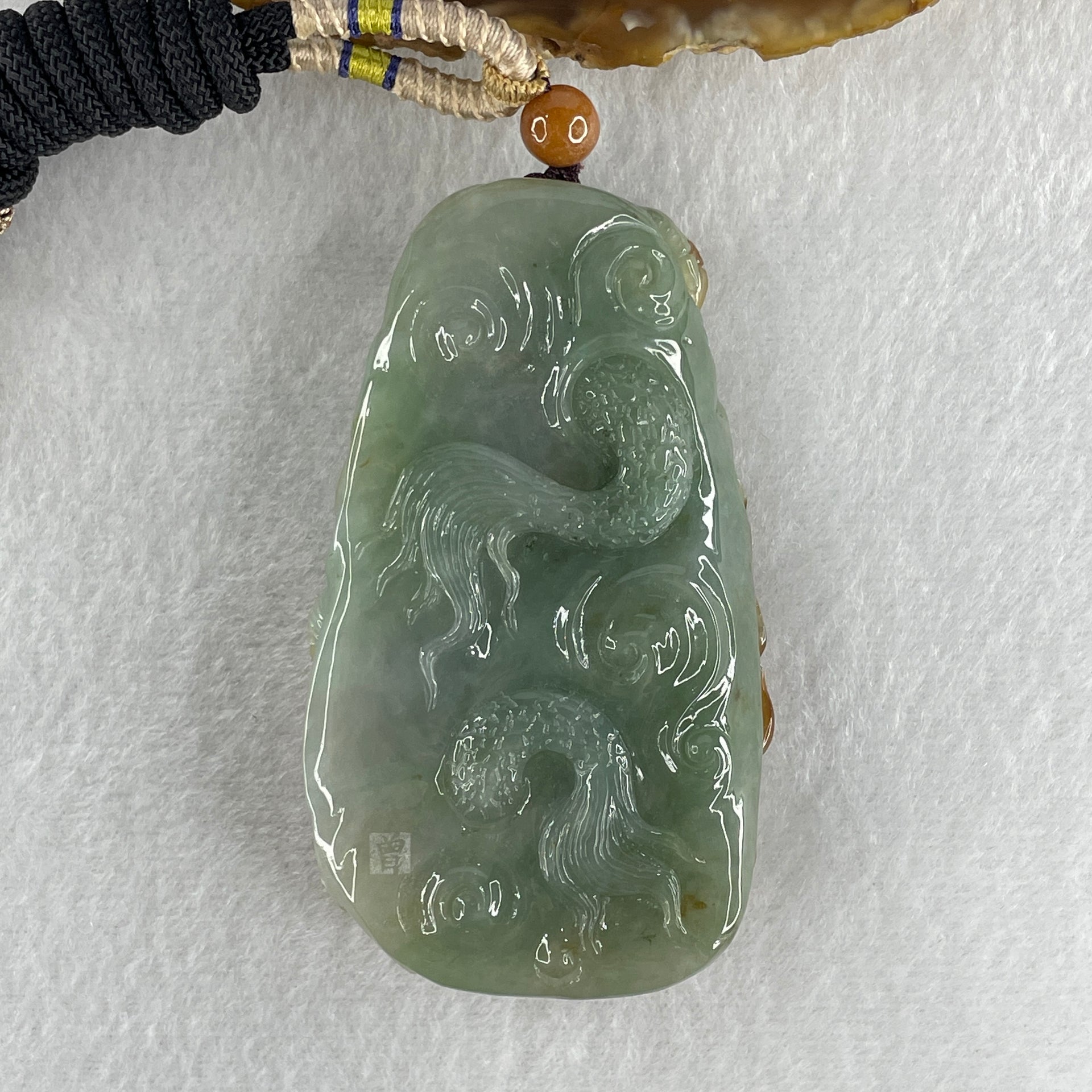 Grand Master Type A Green with Brownish Jadeite Dragon Double Side Pendant 125.78g 77.7 by 46.4 by 18.2mm - Huangs Jadeite and Jewelry Pte Ltd