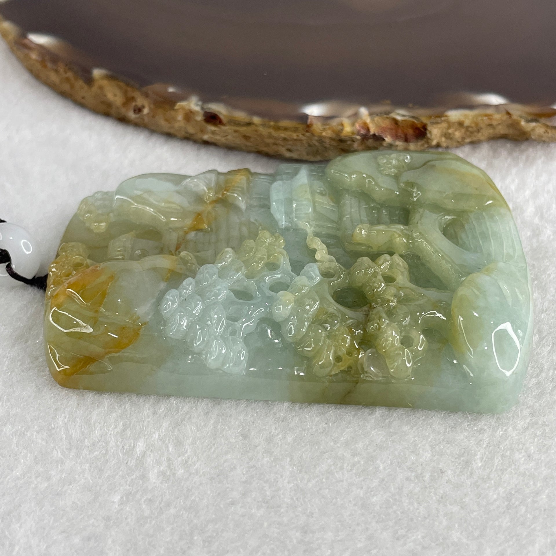Natural Type A Sky Blue with Yellowish Green Jadeite Shan Shui with Gui Ren Benefactor Pendant 94.26g 75.5 by 55.5 by 10.5mm - Huangs Jadeite and Jewelry Pte Ltd