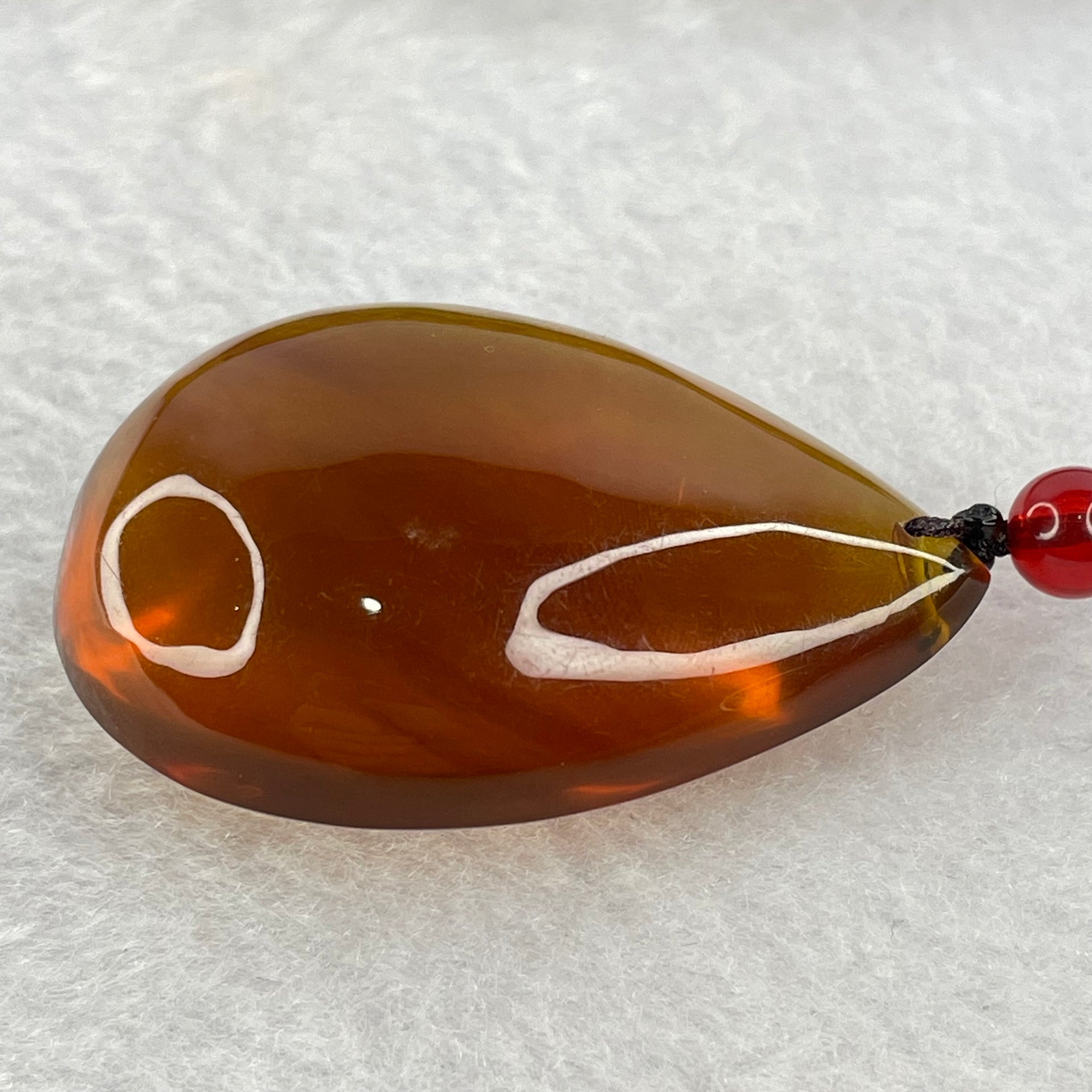 Natural Cognac Amber Teardrop Shaped Pendent 11.85g 42.1 by 29.5 by 16.5mm - Huangs Jadeite and Jewelry Pte Ltd