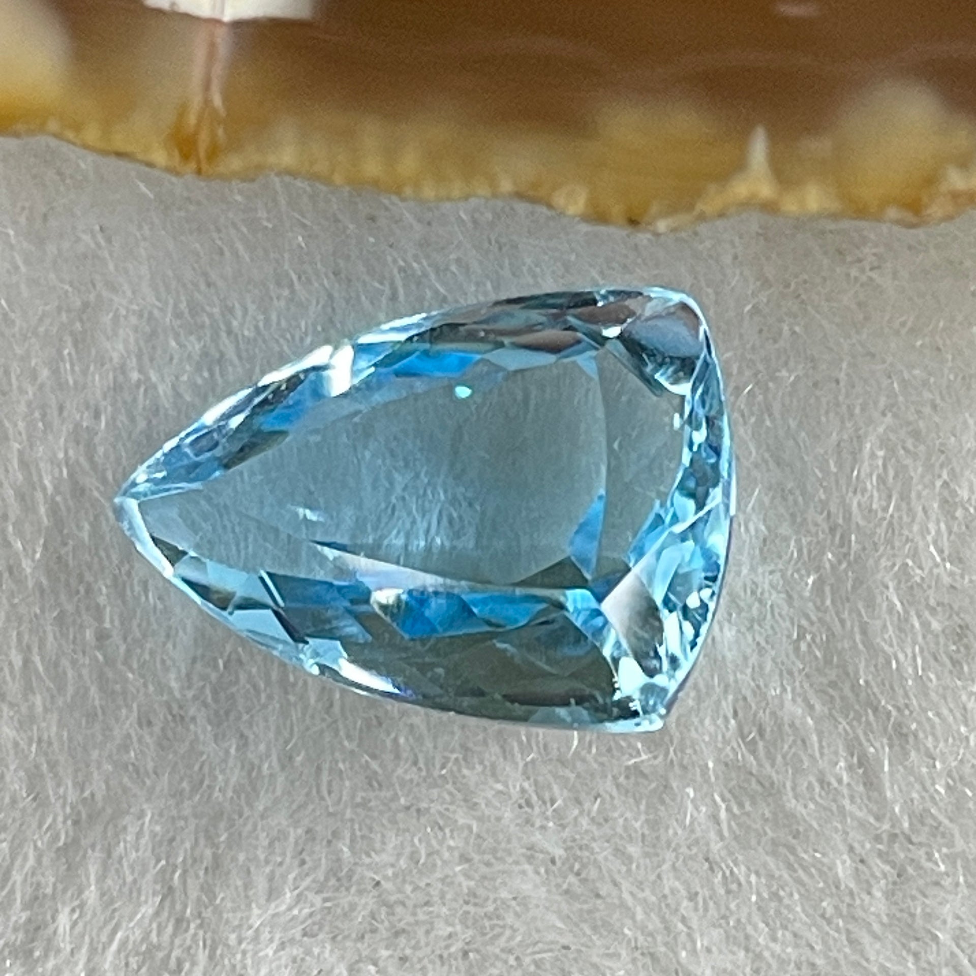 Natural Sky Blue Topaz Trillion Shape 7.69ct 14.4 by 10.2 by 6.9mm - Huangs Jadeite and Jewelry Pte Ltd