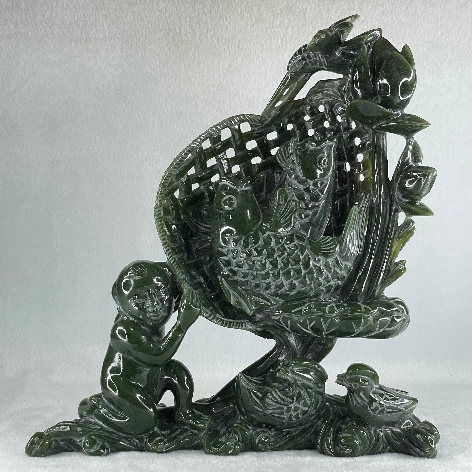 Natural Dark Green Serpentine Double Carp Fish with Gui ren and Lotus and Twin Ducks with Wooden Stand Display 2,032.7g 242.0 by 95.0 by 263.0mm - Huangs Jadeite and Jewelry Pte Ltd