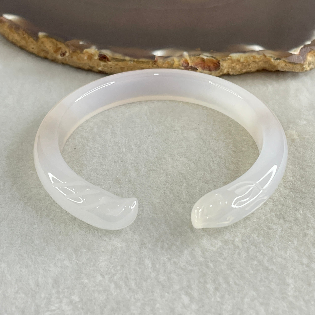 Natural Pinky Agate Fox Bange Internal Dimeter 56.4mm 27.67g 10.2 by 6.9mm - Huangs Jadeite and Jewelry Pte Ltd