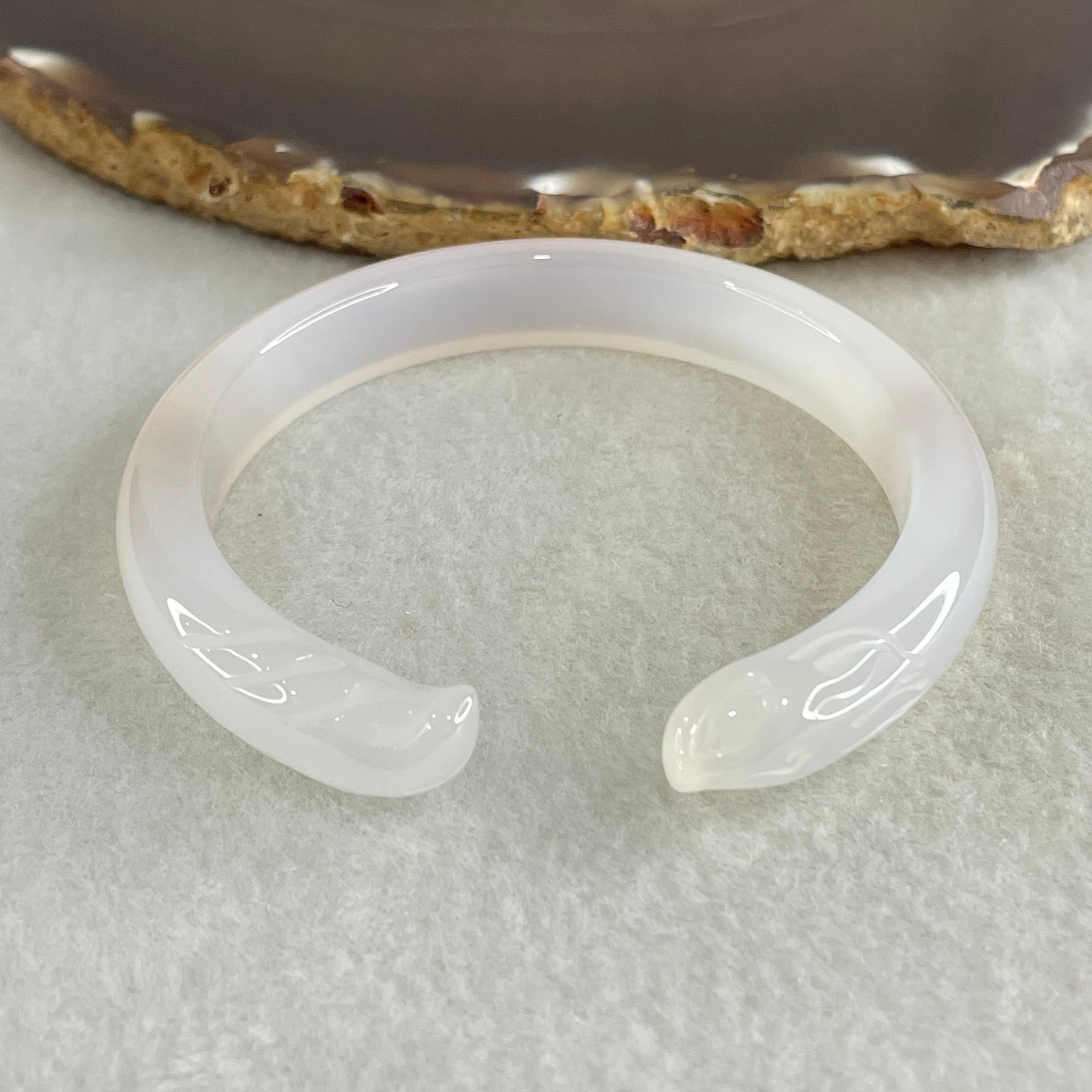 Natural Pinky Agate Fox Bange Internal Dimeter 56.4mm 27.67g 10.2 by 6.9mm - Huangs Jadeite and Jewelry Pte Ltd