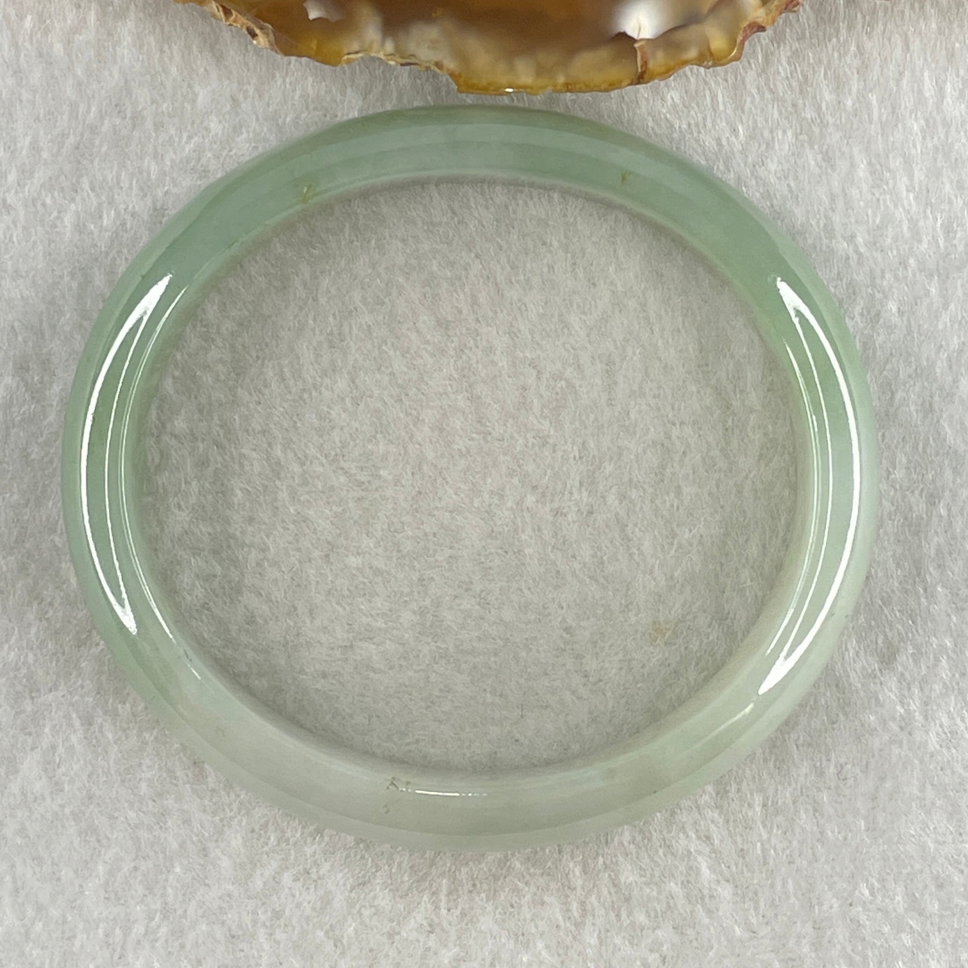 Natural Type A Jelly Light to Faint Green Jadeite Oval Bangle 36.74g Inner Diameter 55.0mm 12.0 by 6.5mm (Close to Perfect) - Huangs Jadeite and Jewelry Pte Ltd