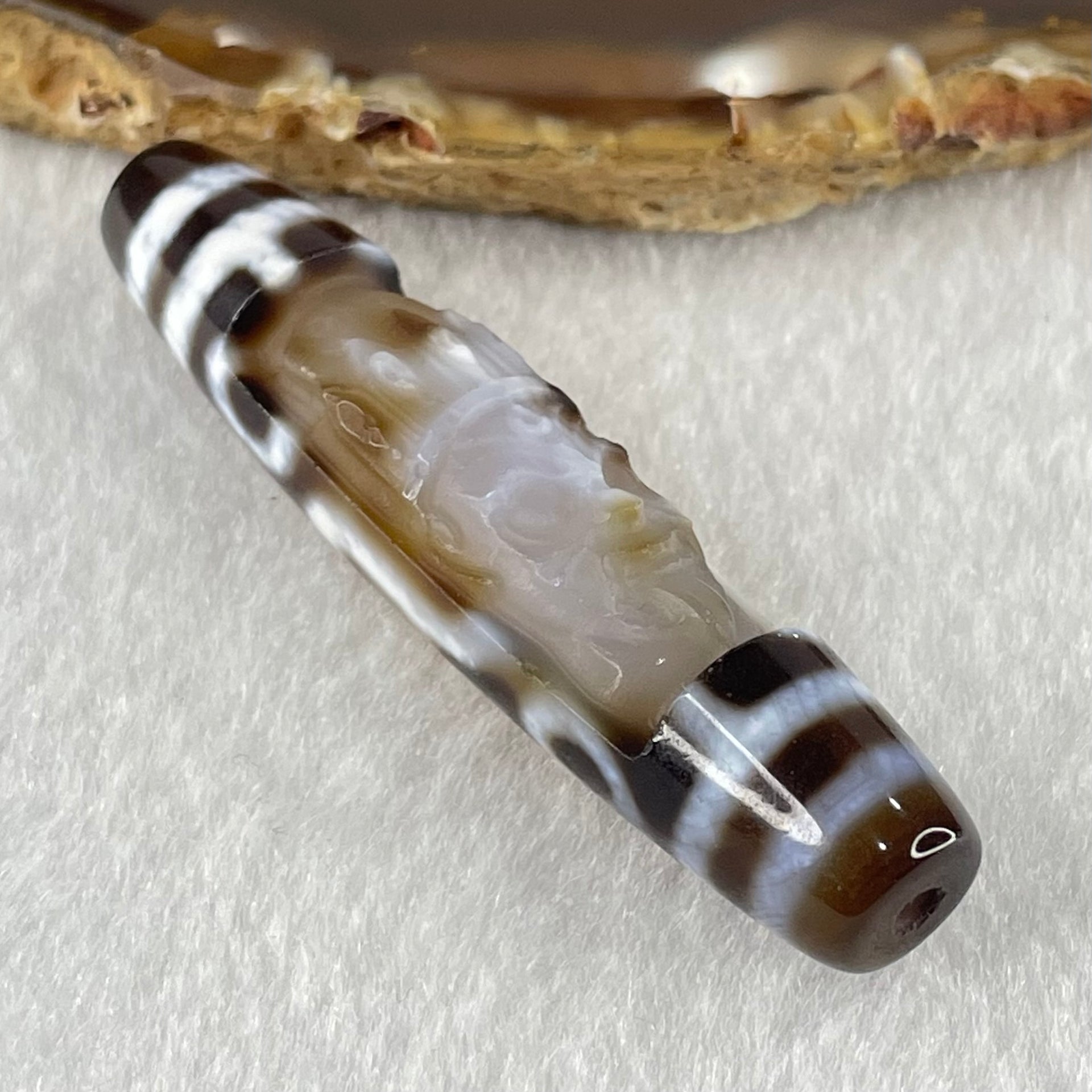 Natural Powerful Tibetan Old Oily Agate Zha Ji La Mu Female Cai Shen Carvings on 9 Eyes Dzi Bead Heavenly Master (Tian Zhu) 九眼扎基拉姆女财神天珠 14.46g 58.4 by 13.0mm - Huangs Jadeite and Jewelry Pte Ltd