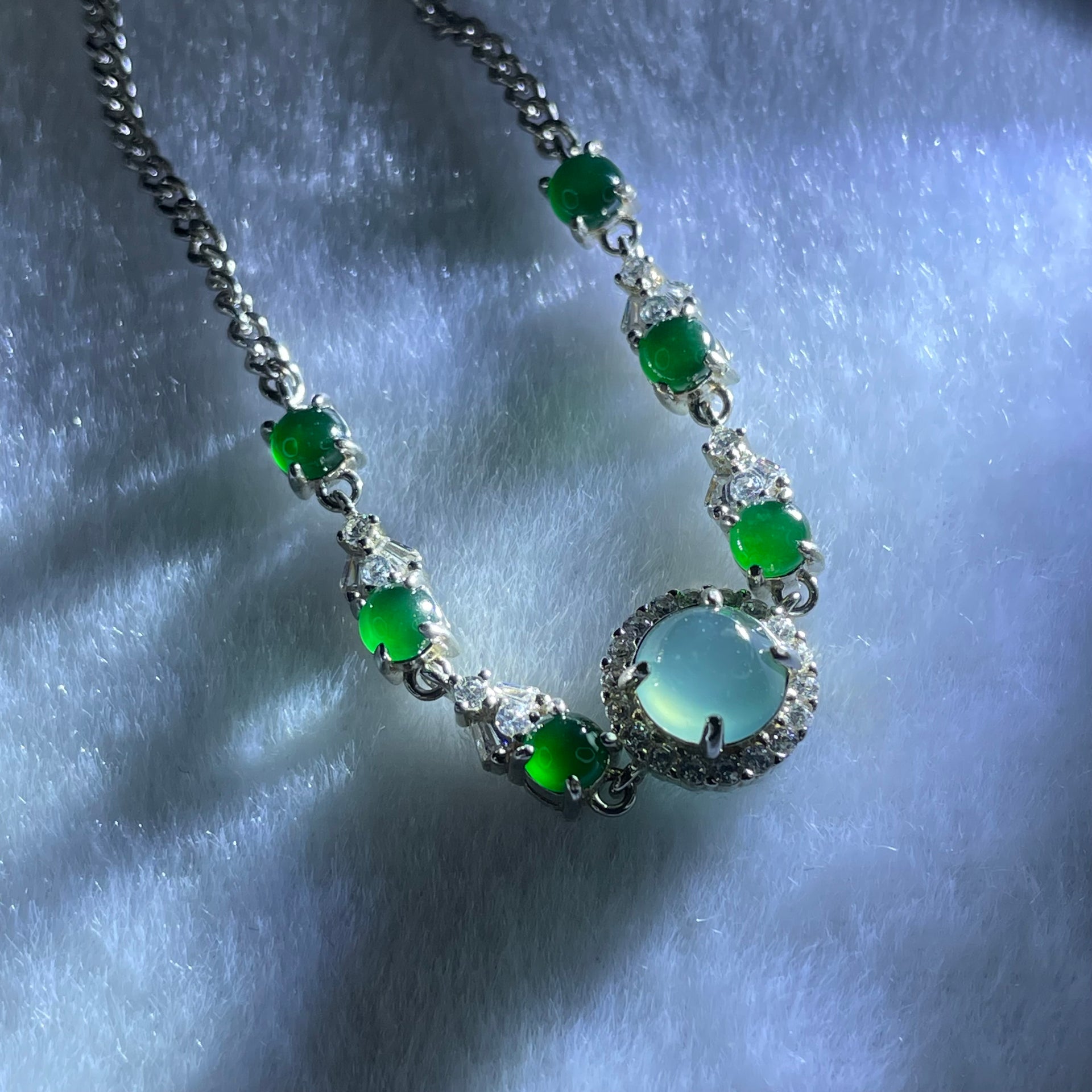 Type A Icy Blueish Green 6.8 by 4.0mm and Icy Green Omphasite Jadeite Cabochon With Crystals in S925 Sliver Bracelet 4.75g - Huangs Jadeite and Jewelry Pte Ltd