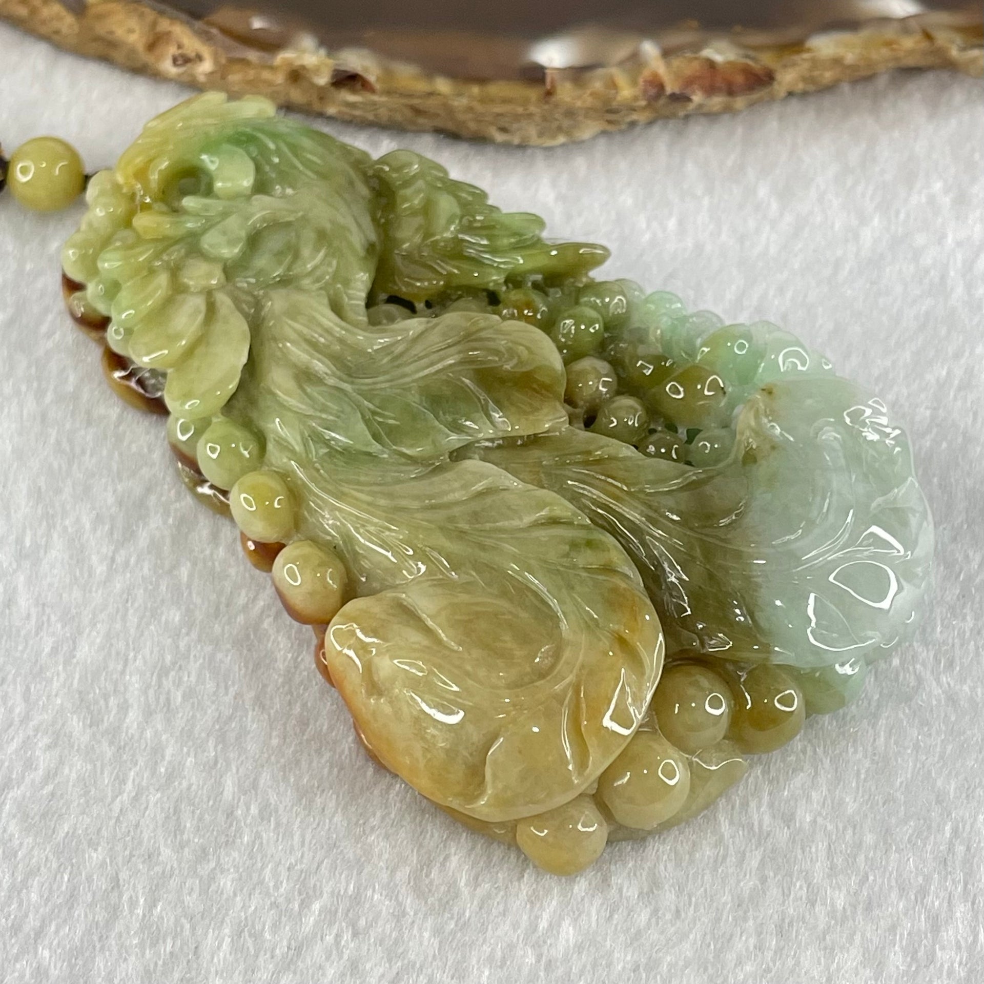 Grandmaster Type A Brownish Green and Faint Lavender Green Jadeite Double Sided Phoenix and Flower Pendant 凤戏牡丹 93.05g 79 by 50.6 by 13mm - Huangs Jadeite and Jewelry Pte Ltd