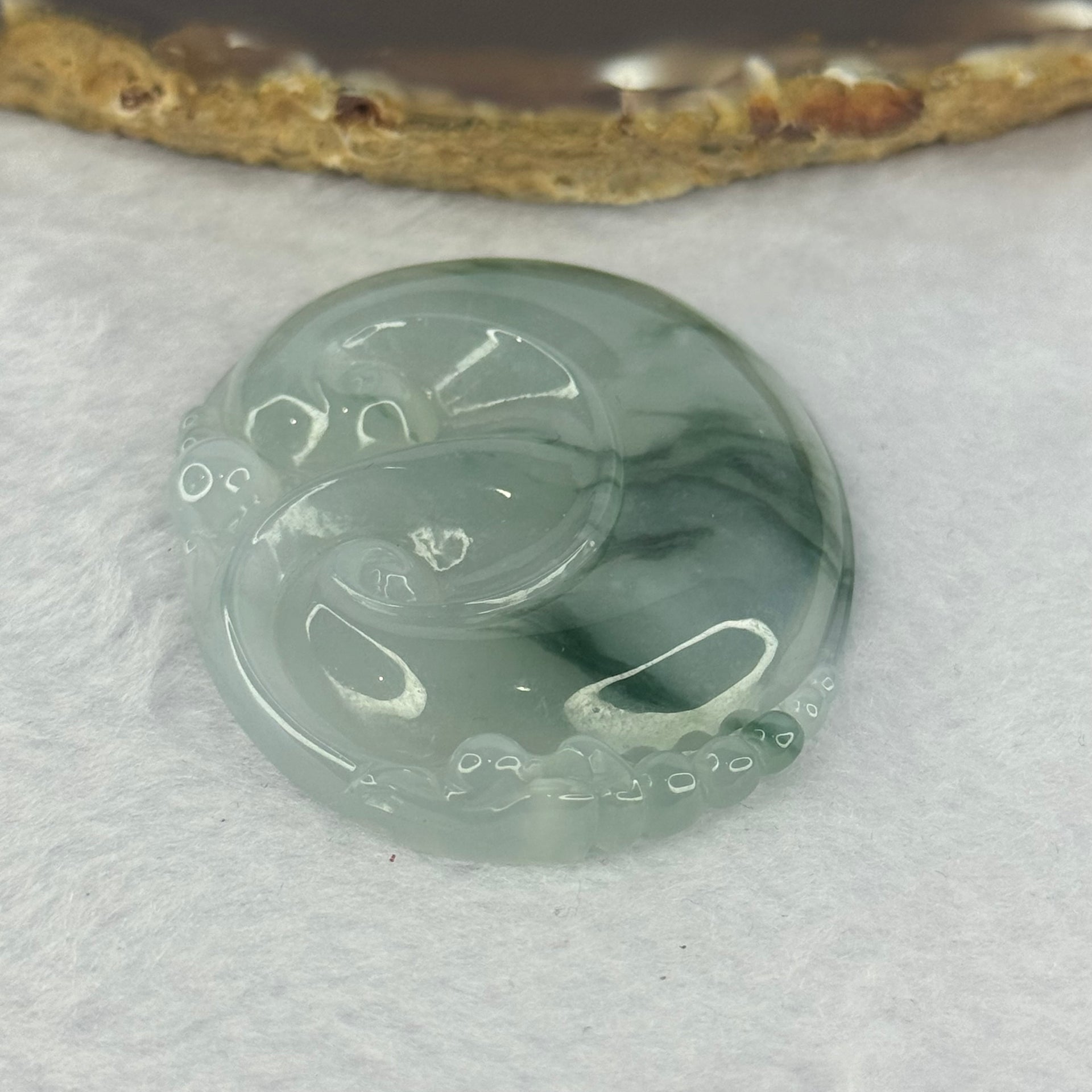 Grandmaster Certified Type A Icy Light Green with Blueish Green Piao Hua Ruyi Pendent 28.04g 53.2 by 42.7 by 7.1mm - Huangs Jadeite and Jewelry Pte Ltd