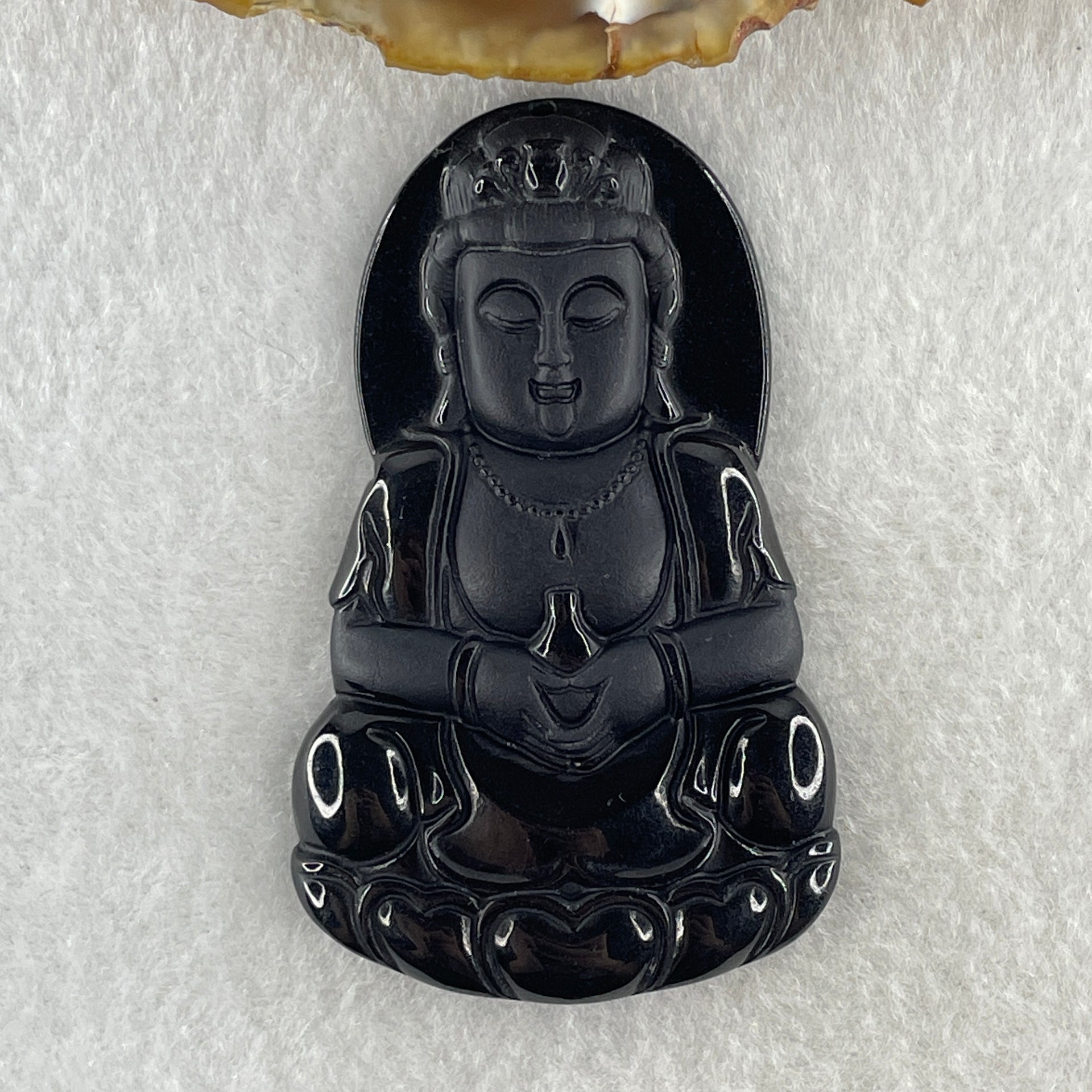Type A Opaque Black Omphacite Jadeite Guan Yin Pendant 28.39g 63.4 by 38.8 by 7.5mm - Huangs Jadeite and Jewelry Pte Ltd
